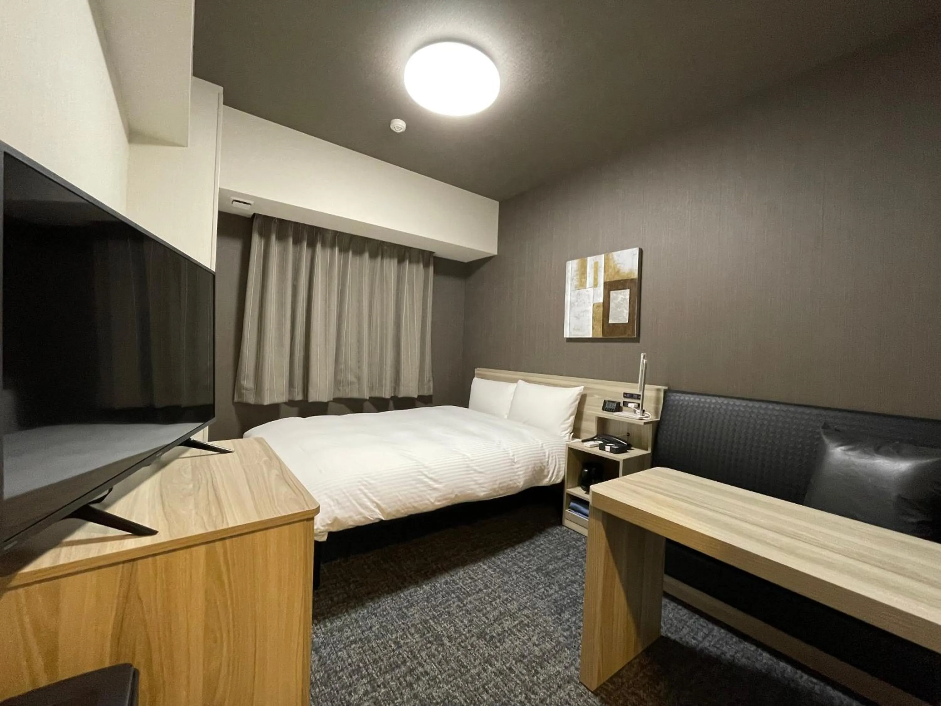 Photo of the whole room, Bed in Hotel Route Inn Mitsuke -Nakanoshima Mitsuke Inter-