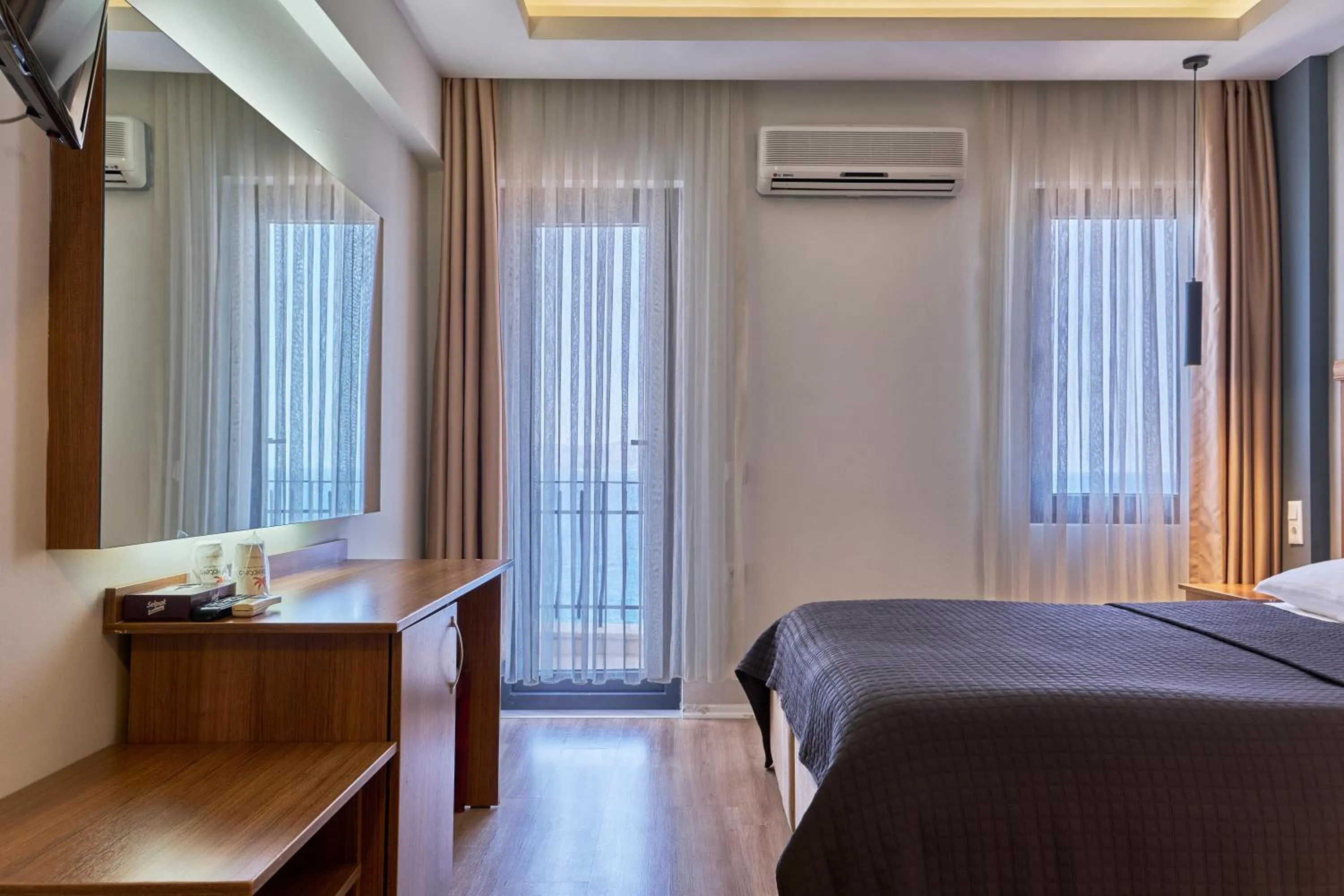 Photo of the whole room, Bed in Aqua Princess Hotel