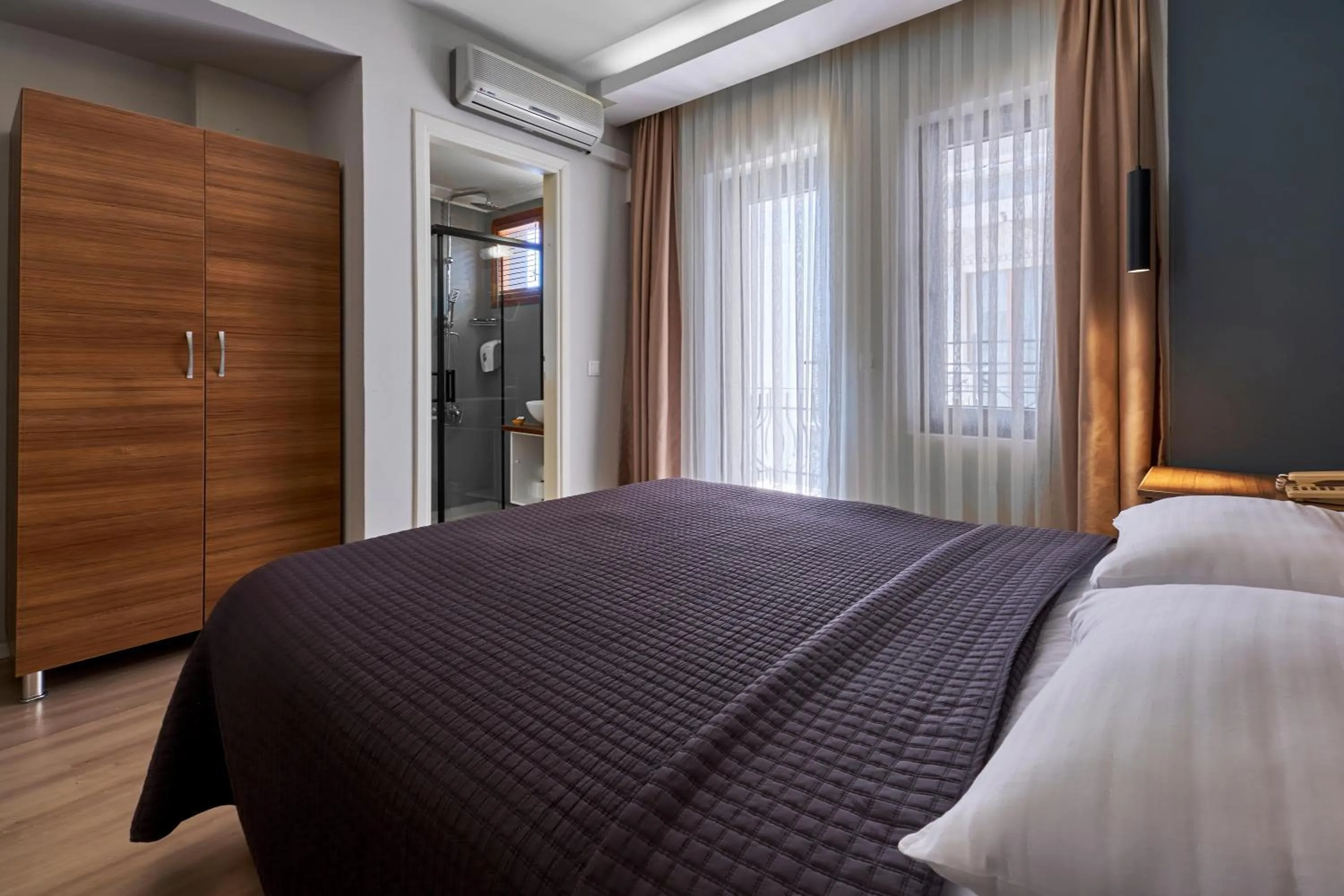 Photo of the whole room, Bed in Aqua Princess Hotel