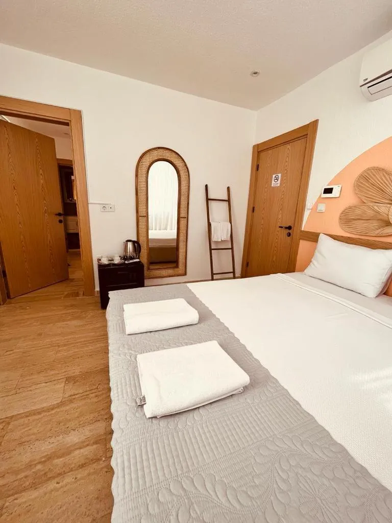 Bed in MARE MARIN BOUTIQUE HOTEL