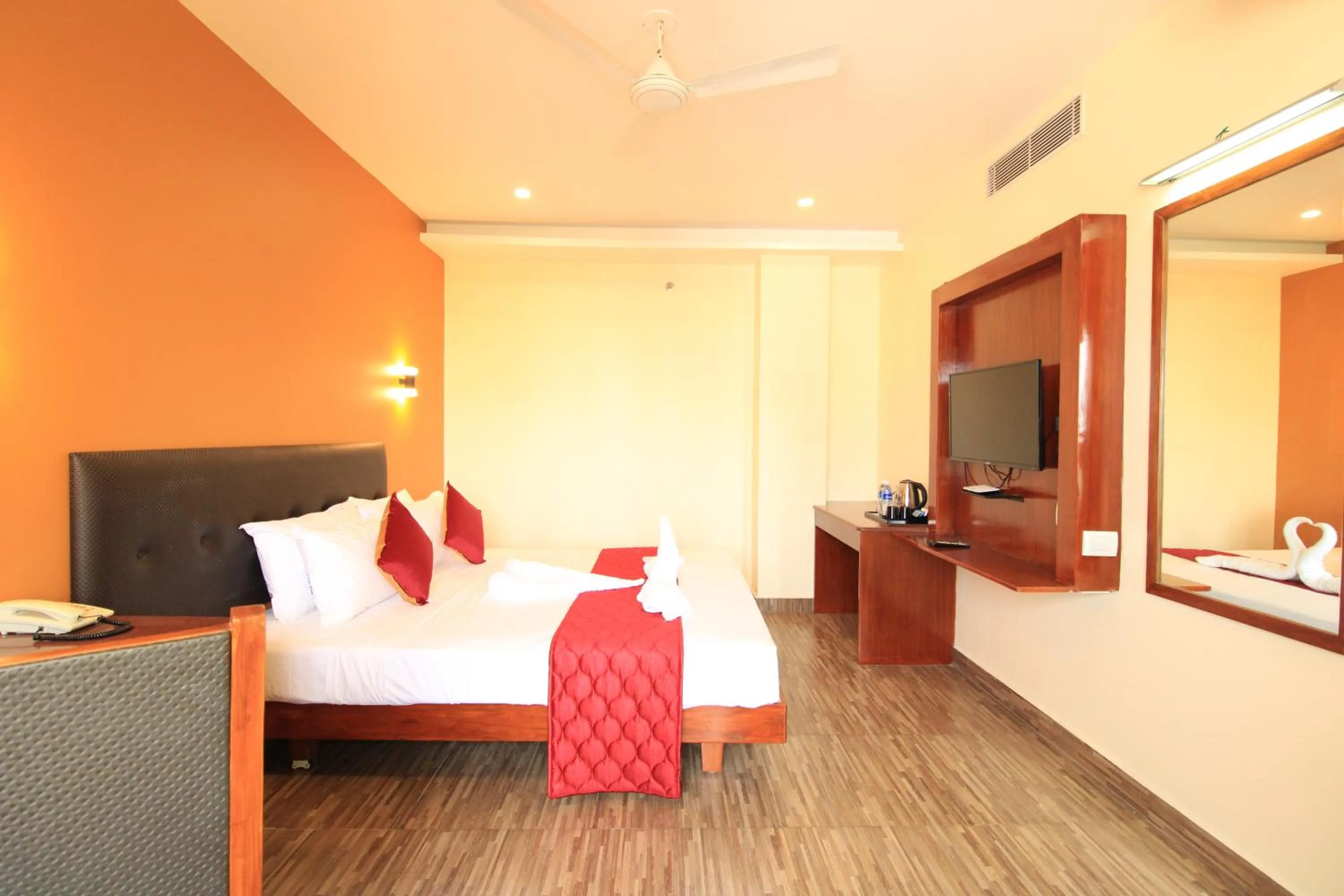 Photo of the whole room, Bed in Pondy Southern Residency