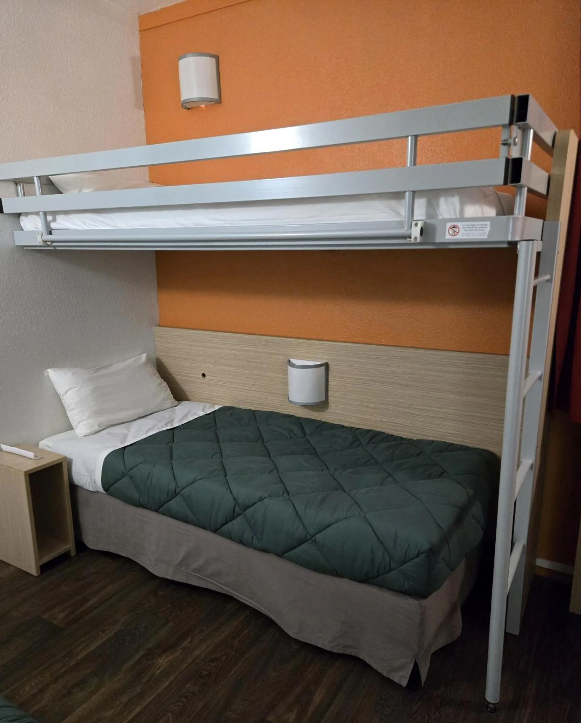 Bed in PREMIERE CLASSE ANGERS SUD Louvre Hotels group