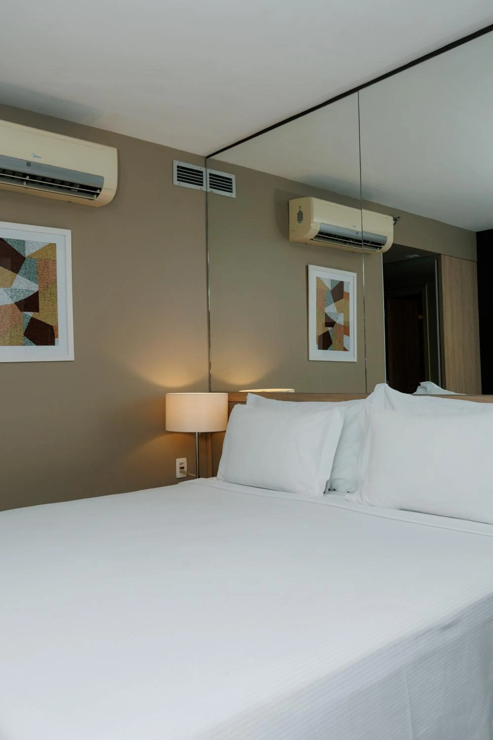 Bed in eSuites Savassi Toscanini