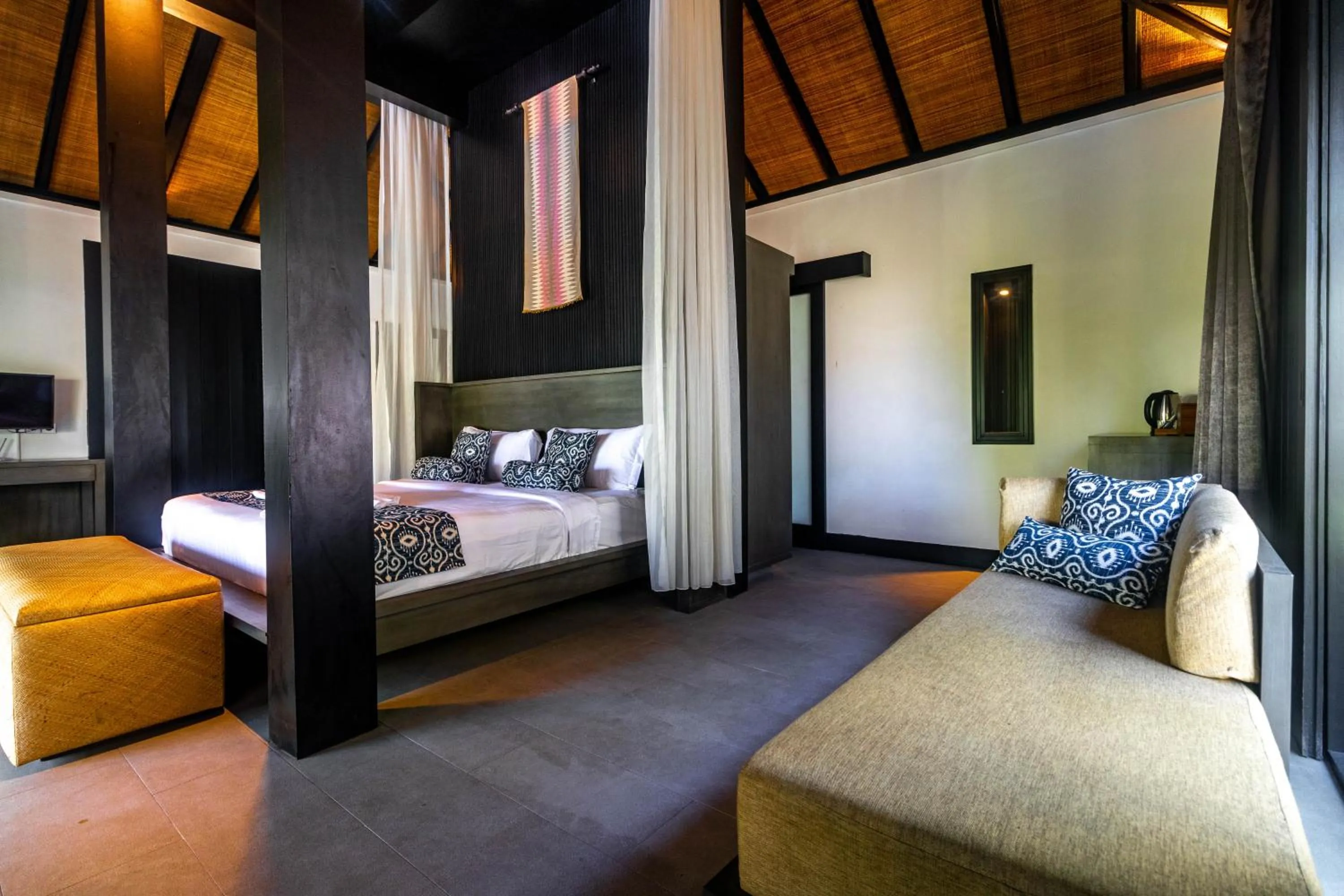 Bed in Surya Melasti Beach Villa