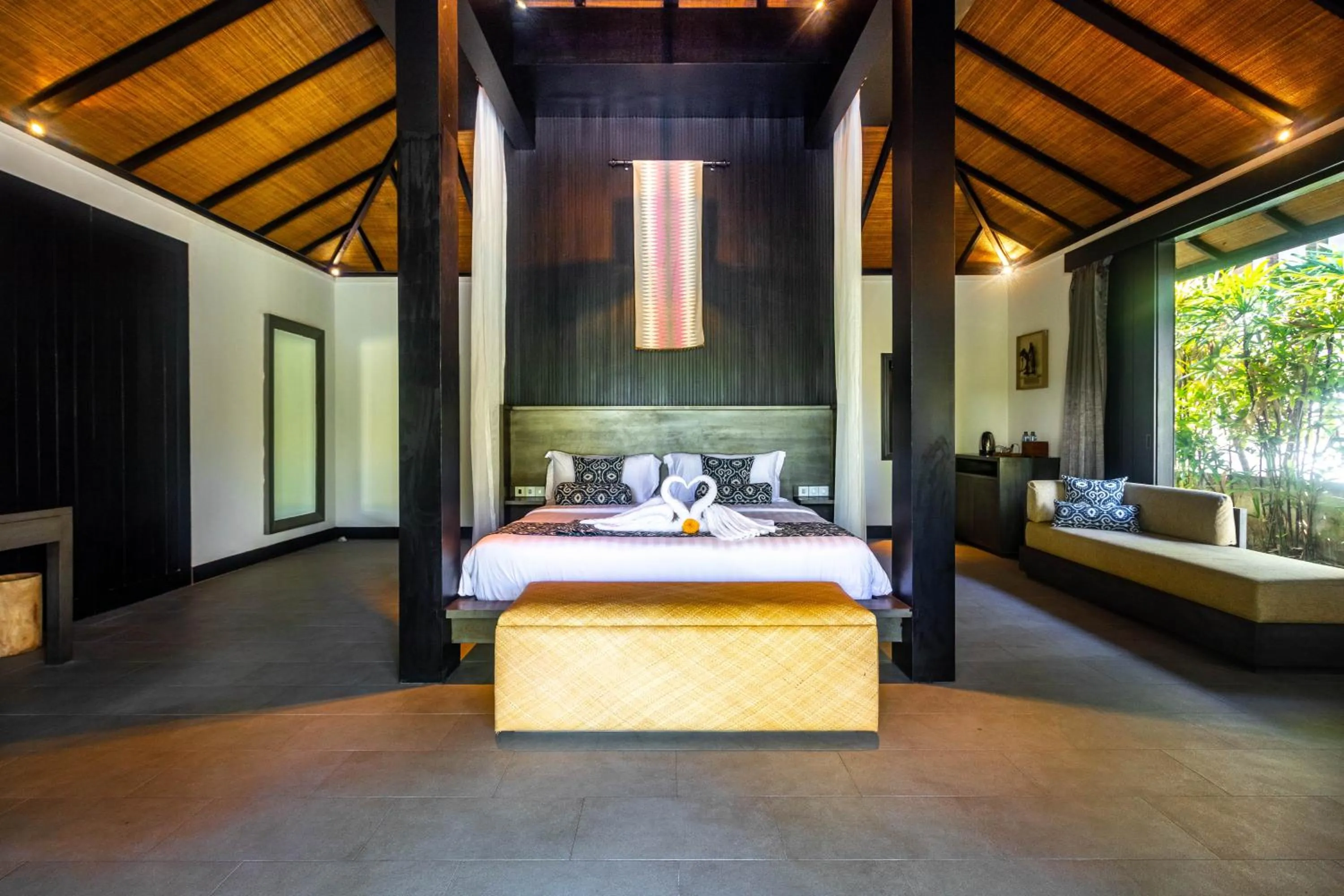 Bed in Surya Melasti Beach Villa