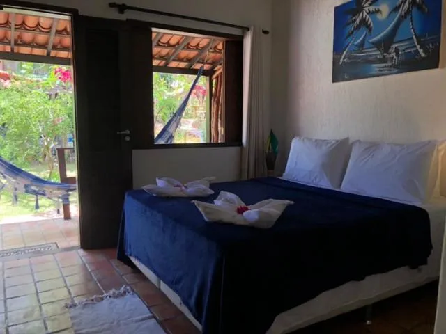 Bed in Pousada Pomar da Pipa