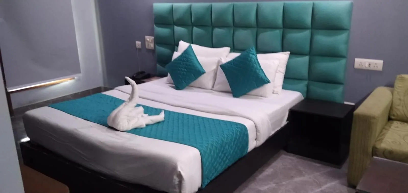 Bed in Asian Suites IFFCO Metro Station Gurugram