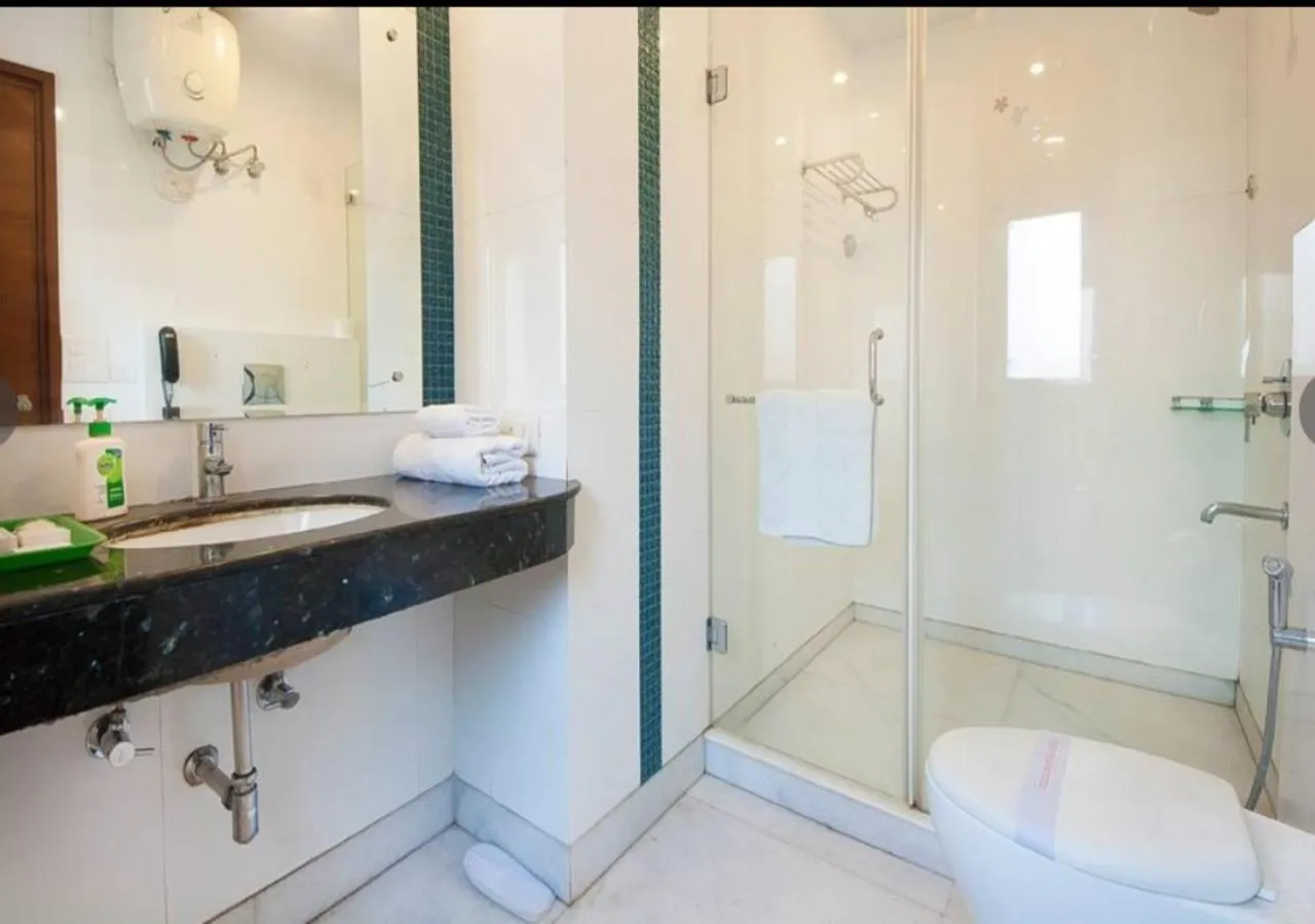 Bathroom in Asian Suites IFFCO Metro Station Gurugram