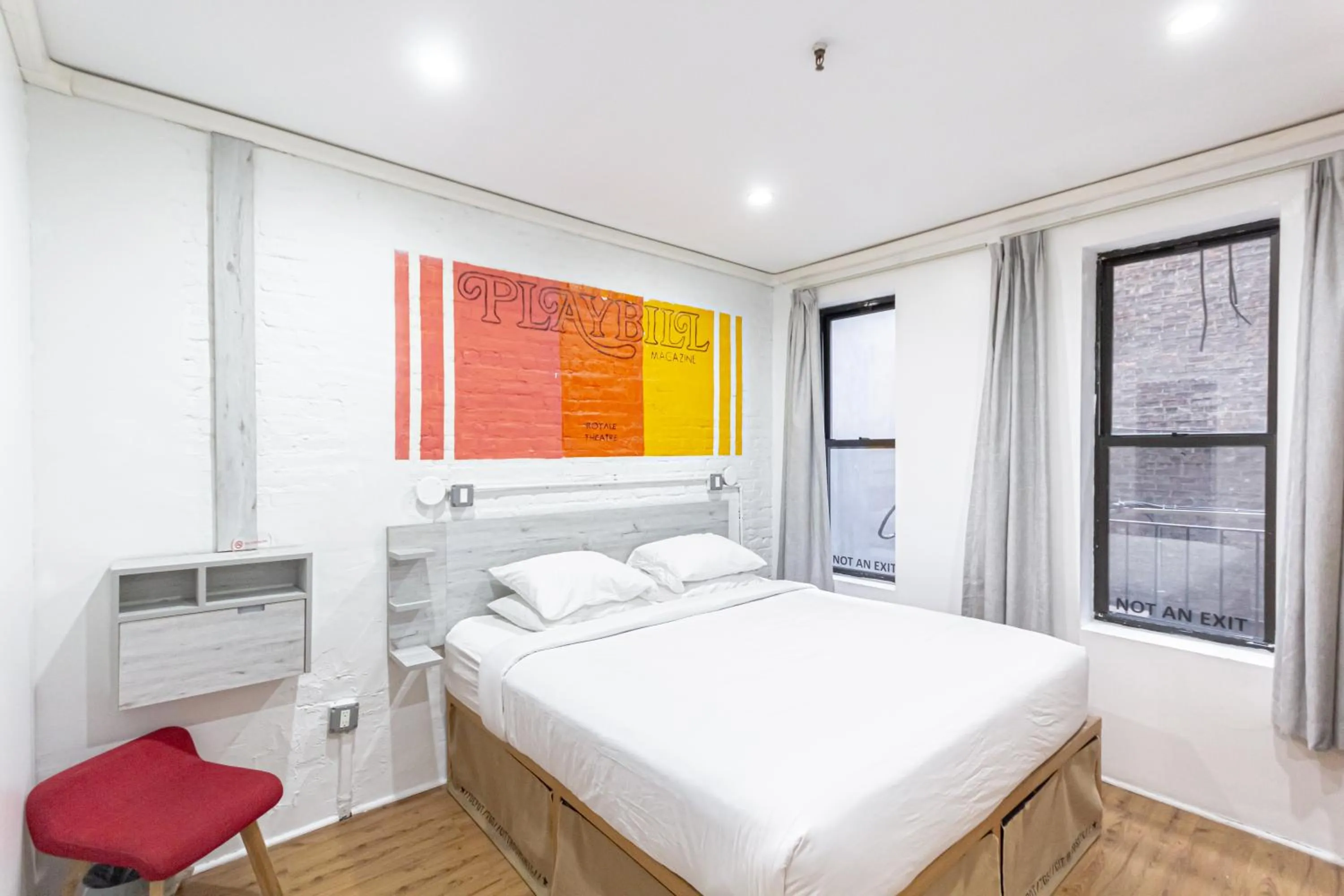 Bed in JG Times SQ Hotel by JGSTAY