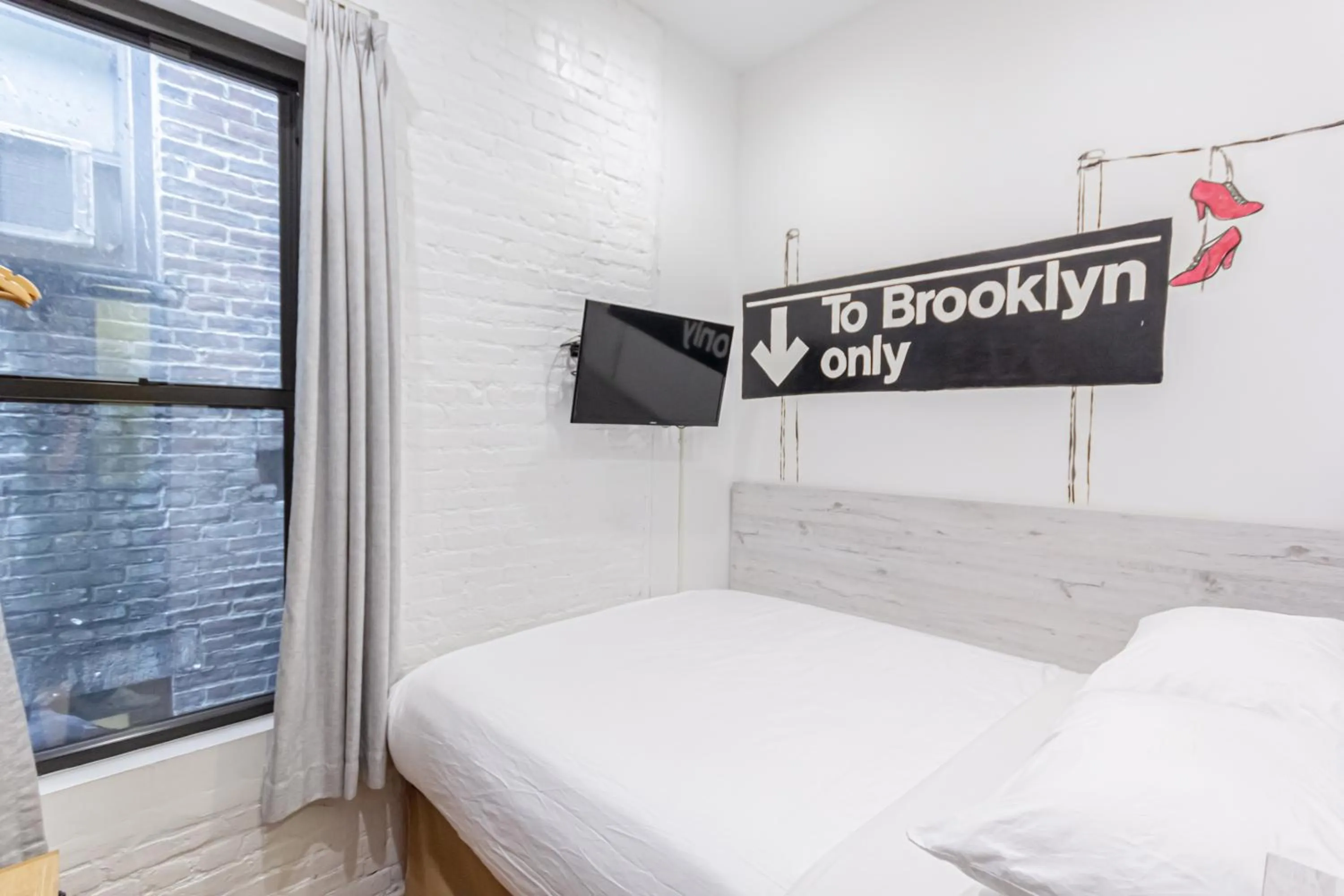 Bedroom, Bed in JG Times SQ Hotel by JGSTAY