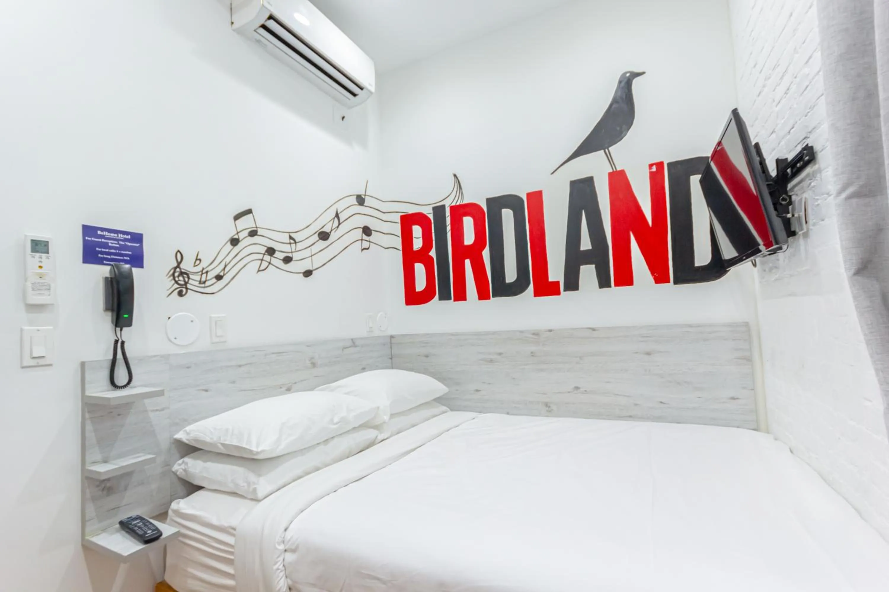 Bed in JG Times SQ Hotel by JGSTAY