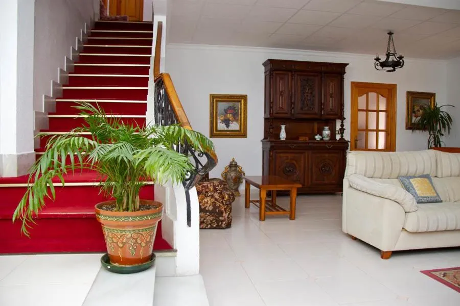 Communal lounge/ TV room in Hotel Mi Casa