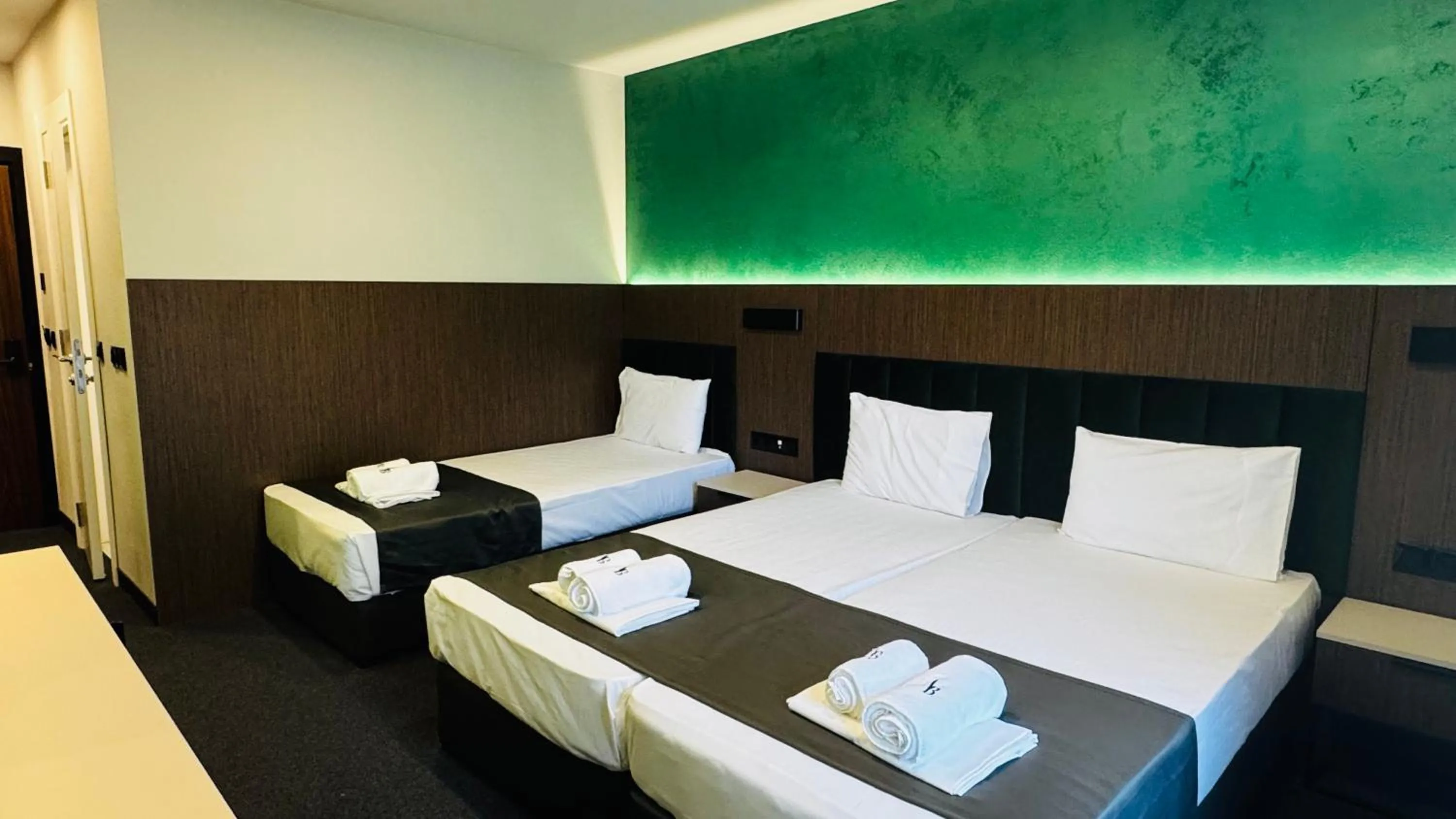 Bed in Atliman Beach Park Hotel