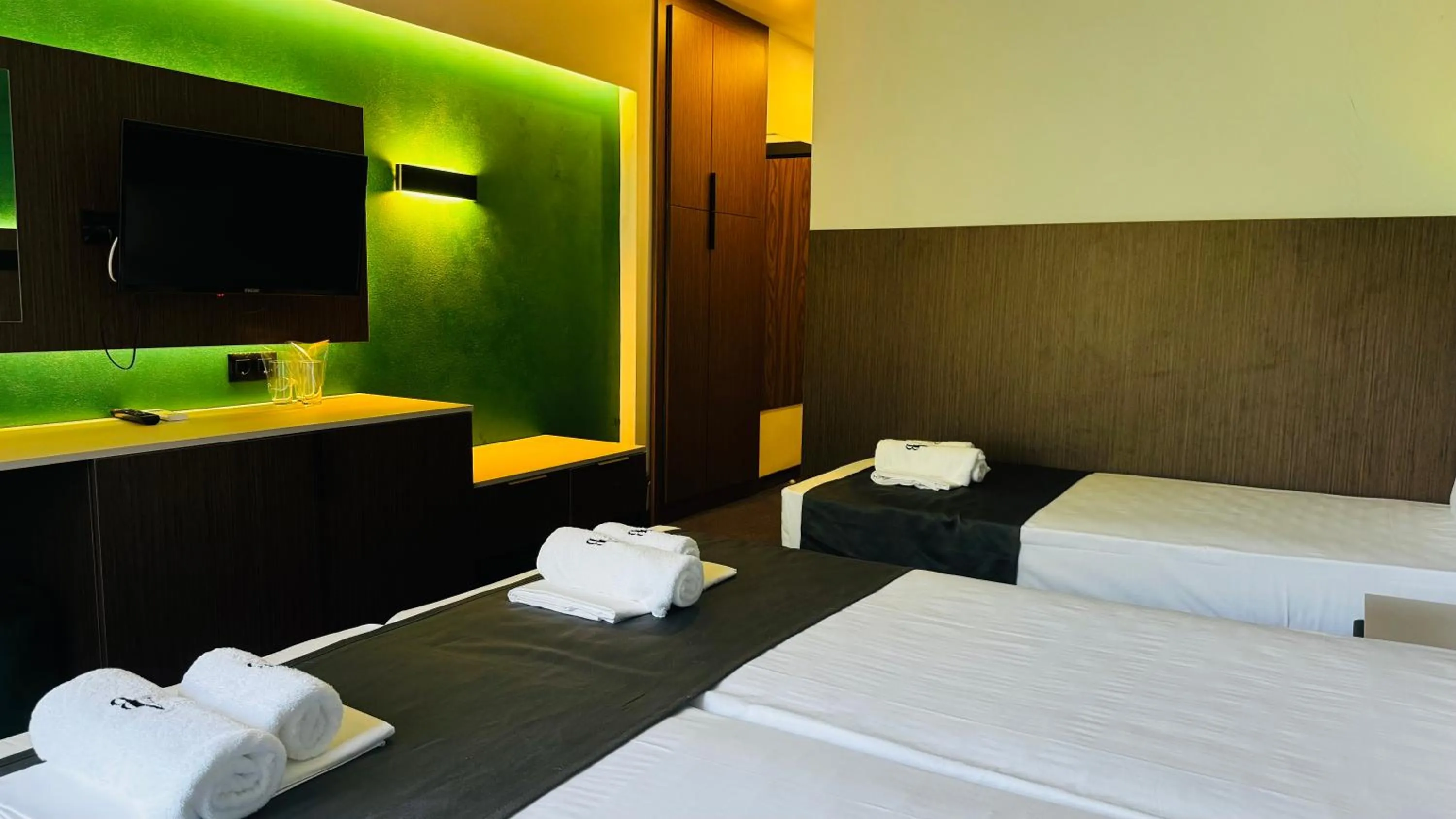 Bed in Atliman Beach Park Hotel