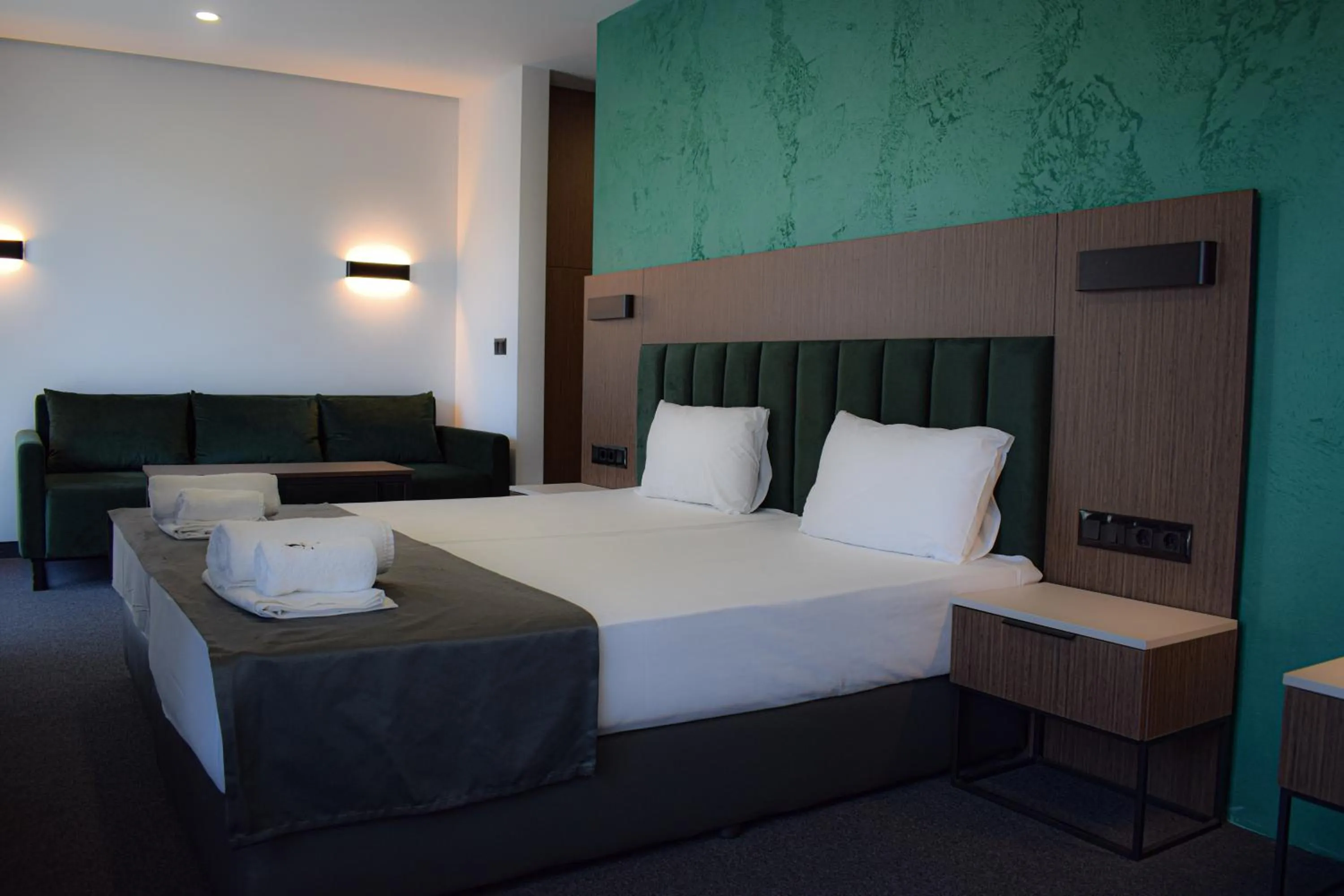 Bed in Atliman Beach Park Hotel