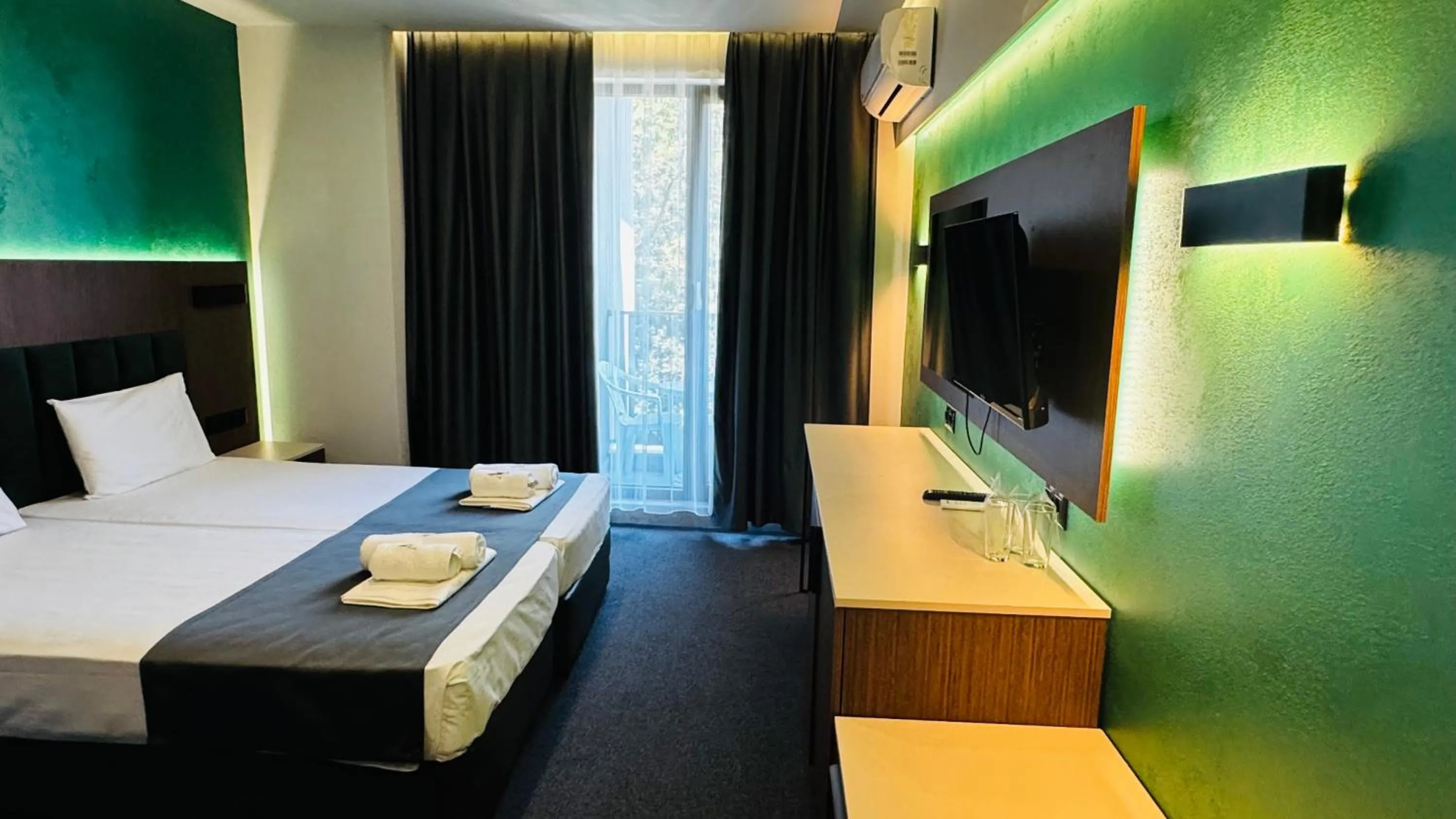 Bed in Atliman Beach Park Hotel