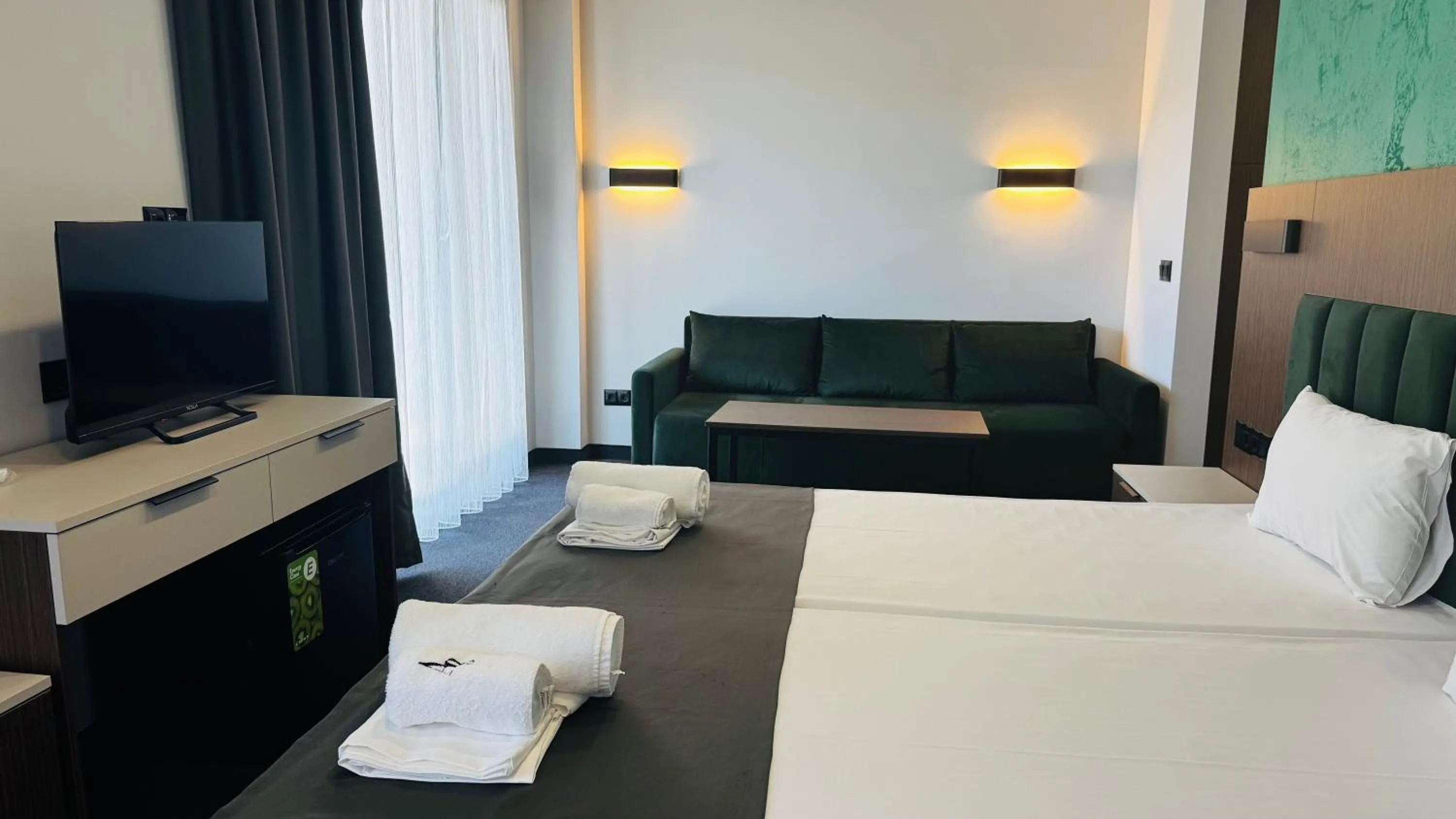 Bed in Atliman Beach Park Hotel