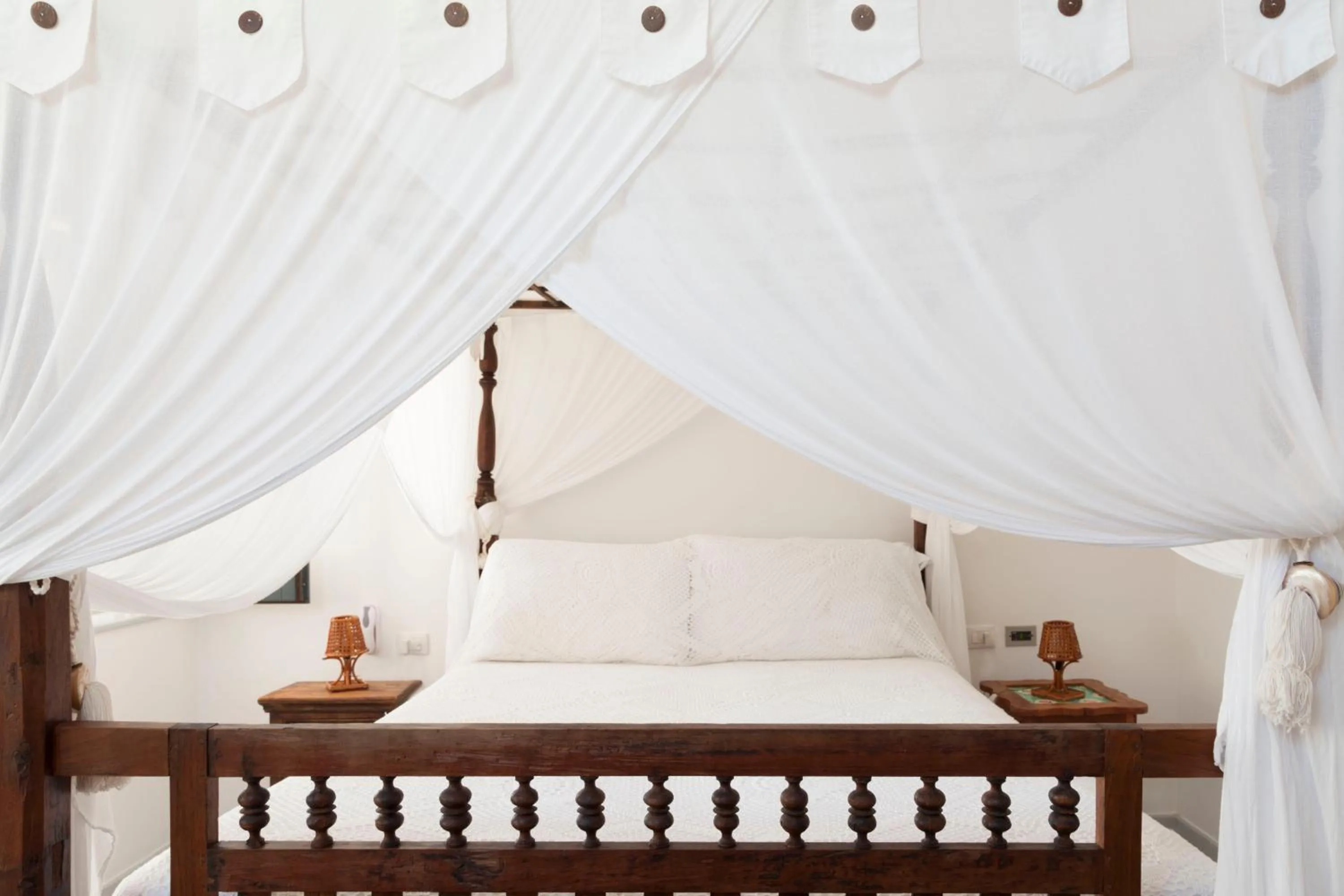 Bed in Quartara Boutique Hotel