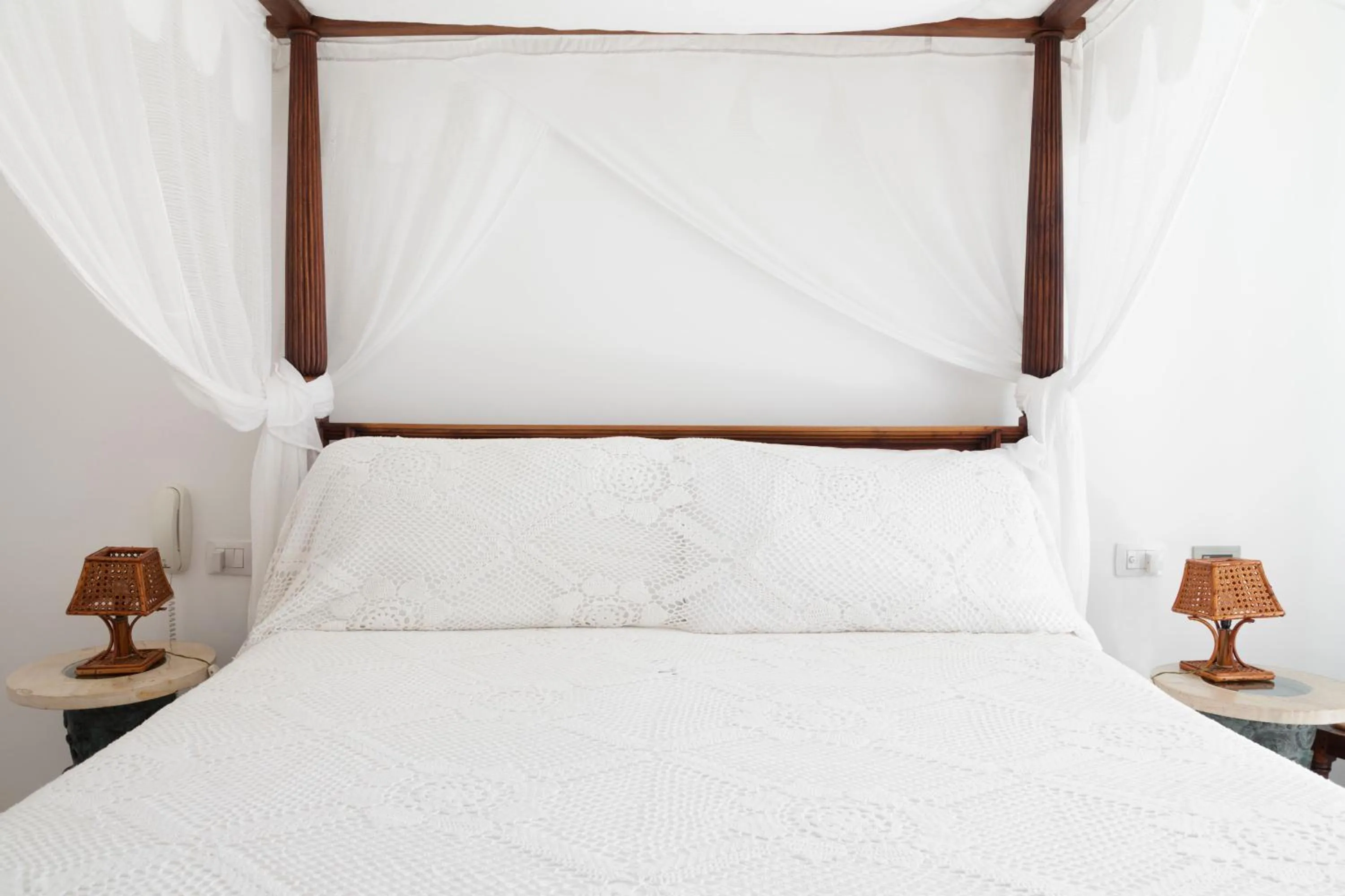 Bed in Quartara Boutique Hotel