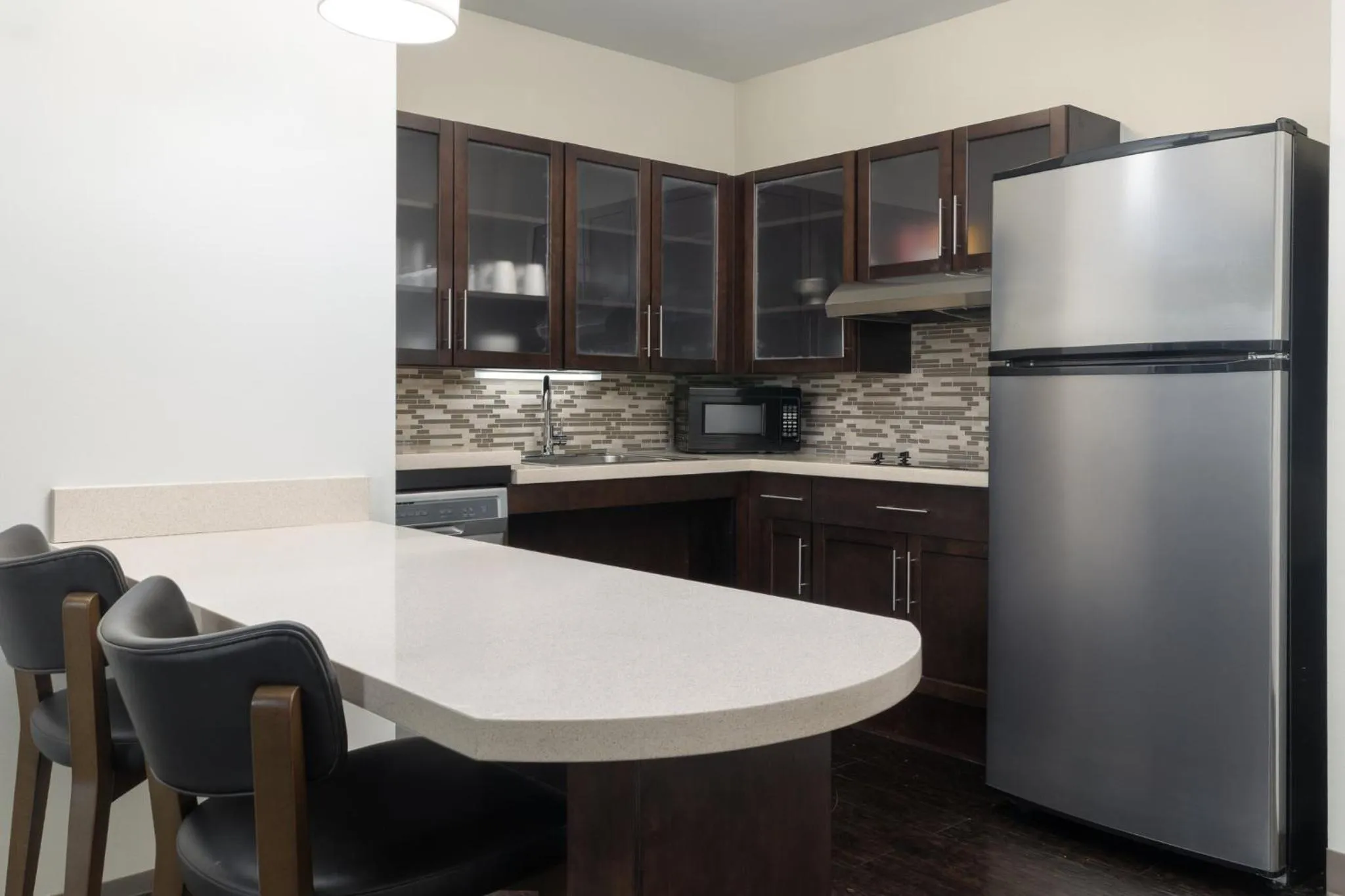 Kitchen or kitchenette in Staybridge Suites Denver - Central Park by IHG