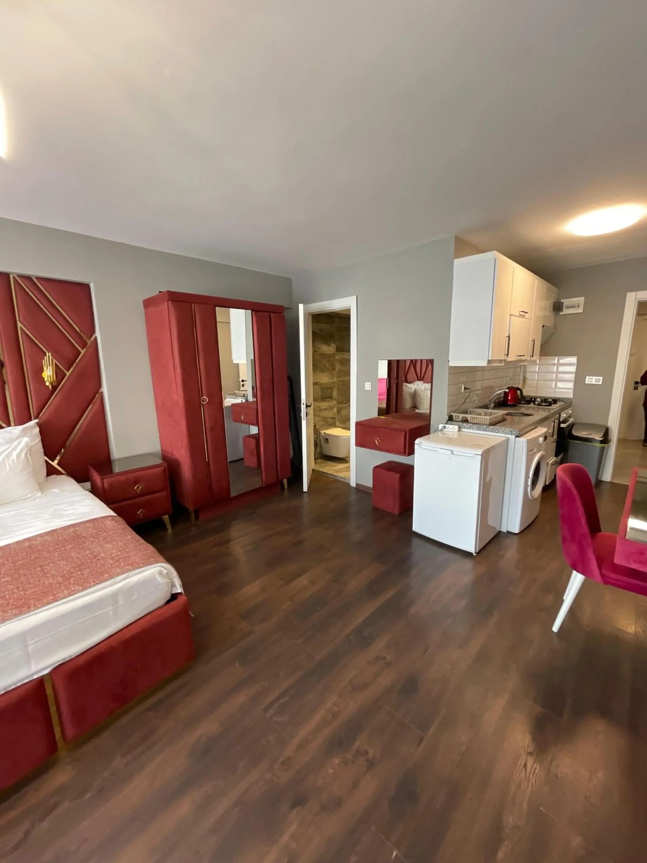 Bed in Aymira Suite Hotel