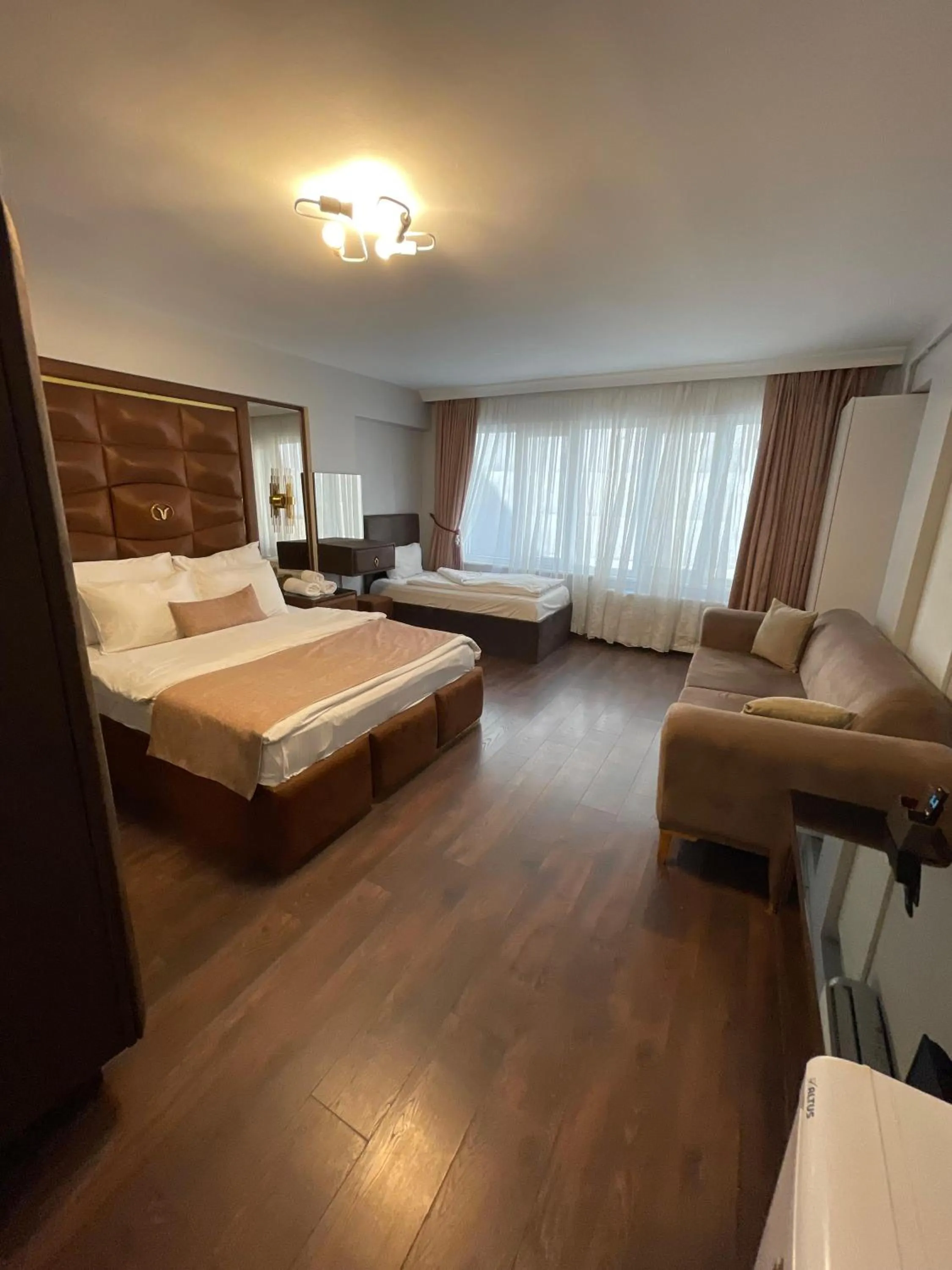 Bed in Aymira Suite Hotel