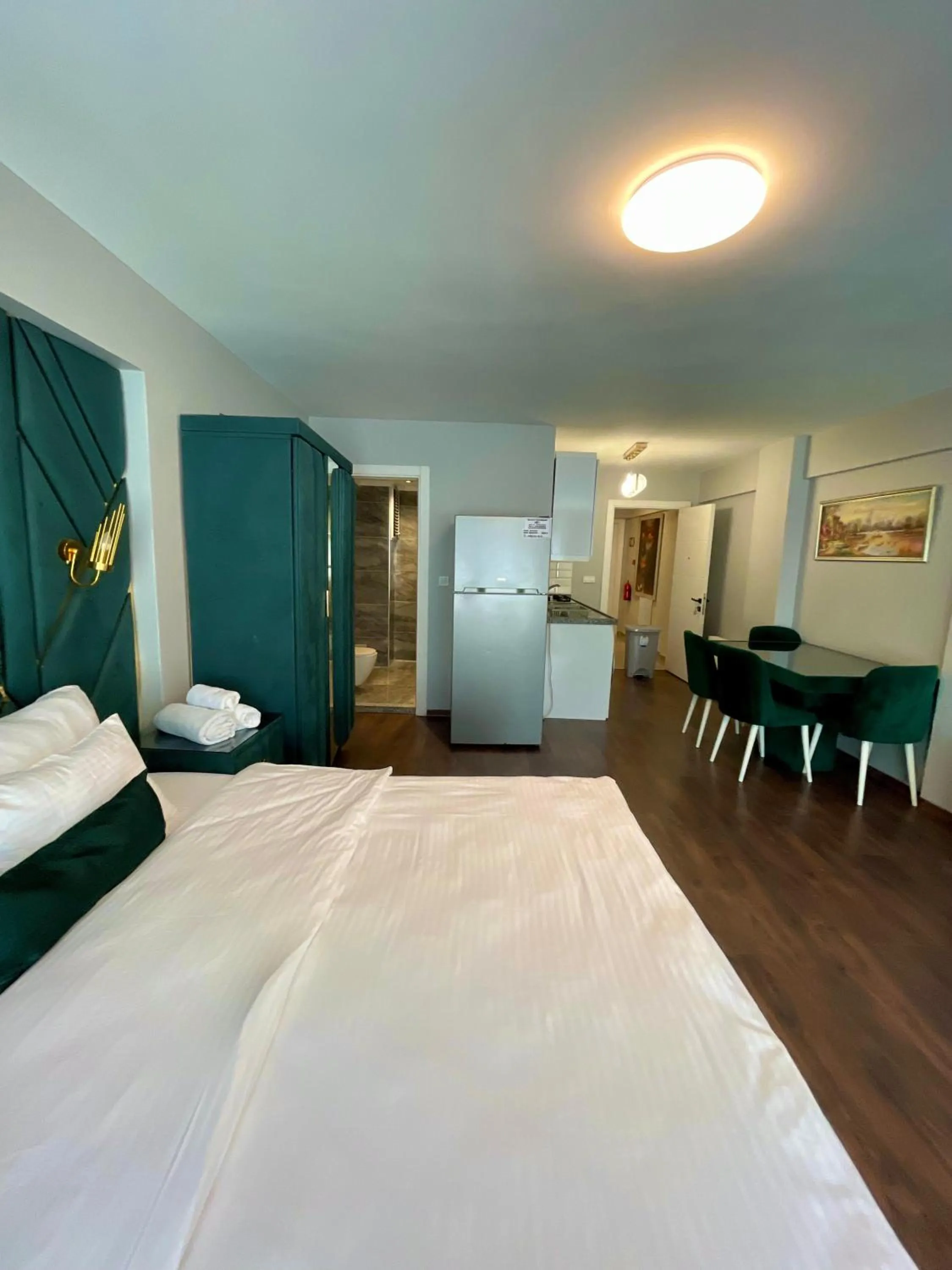 Bed in Aymira Suite Hotel