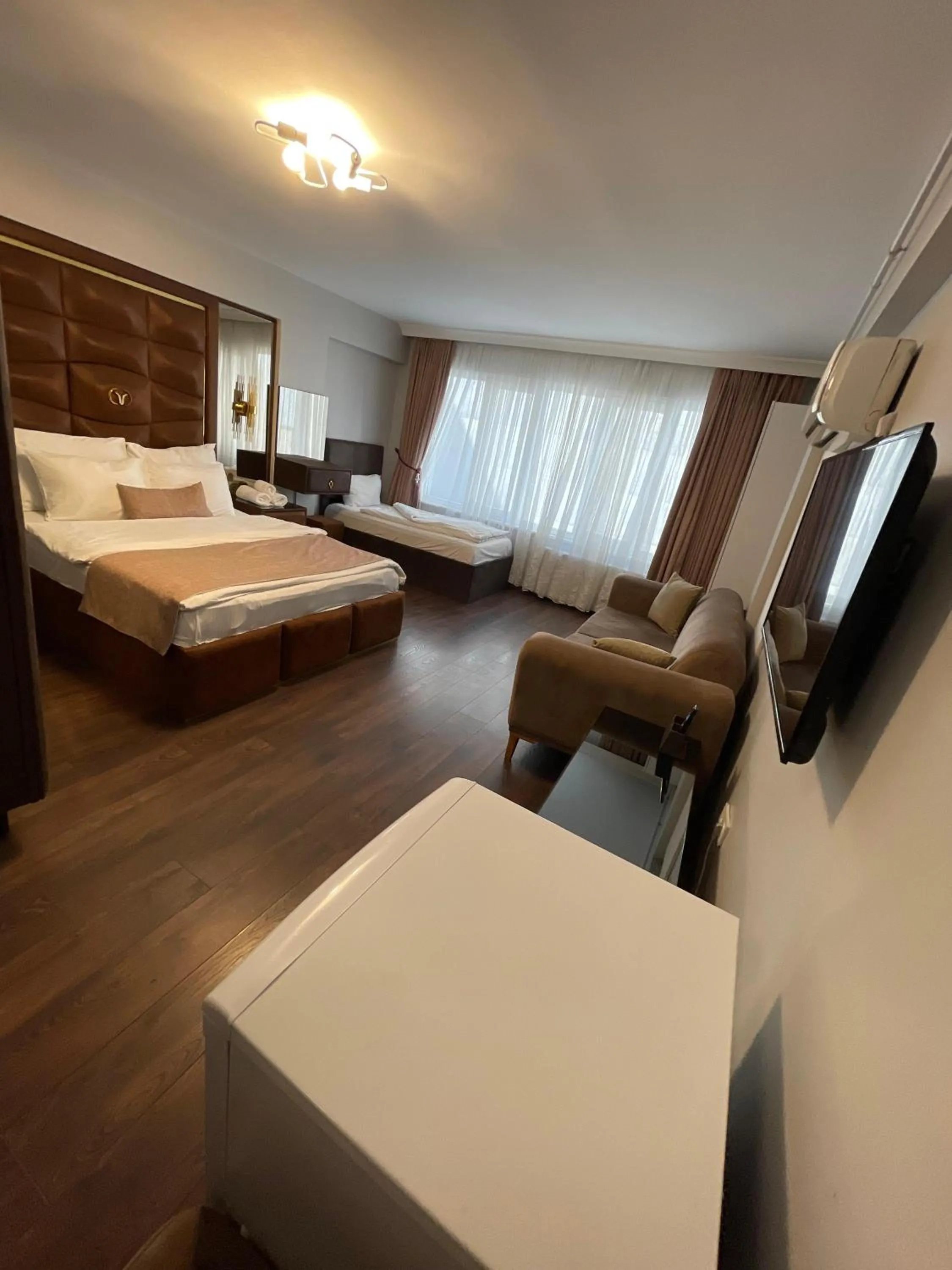 Bed in Aymira Suite Hotel