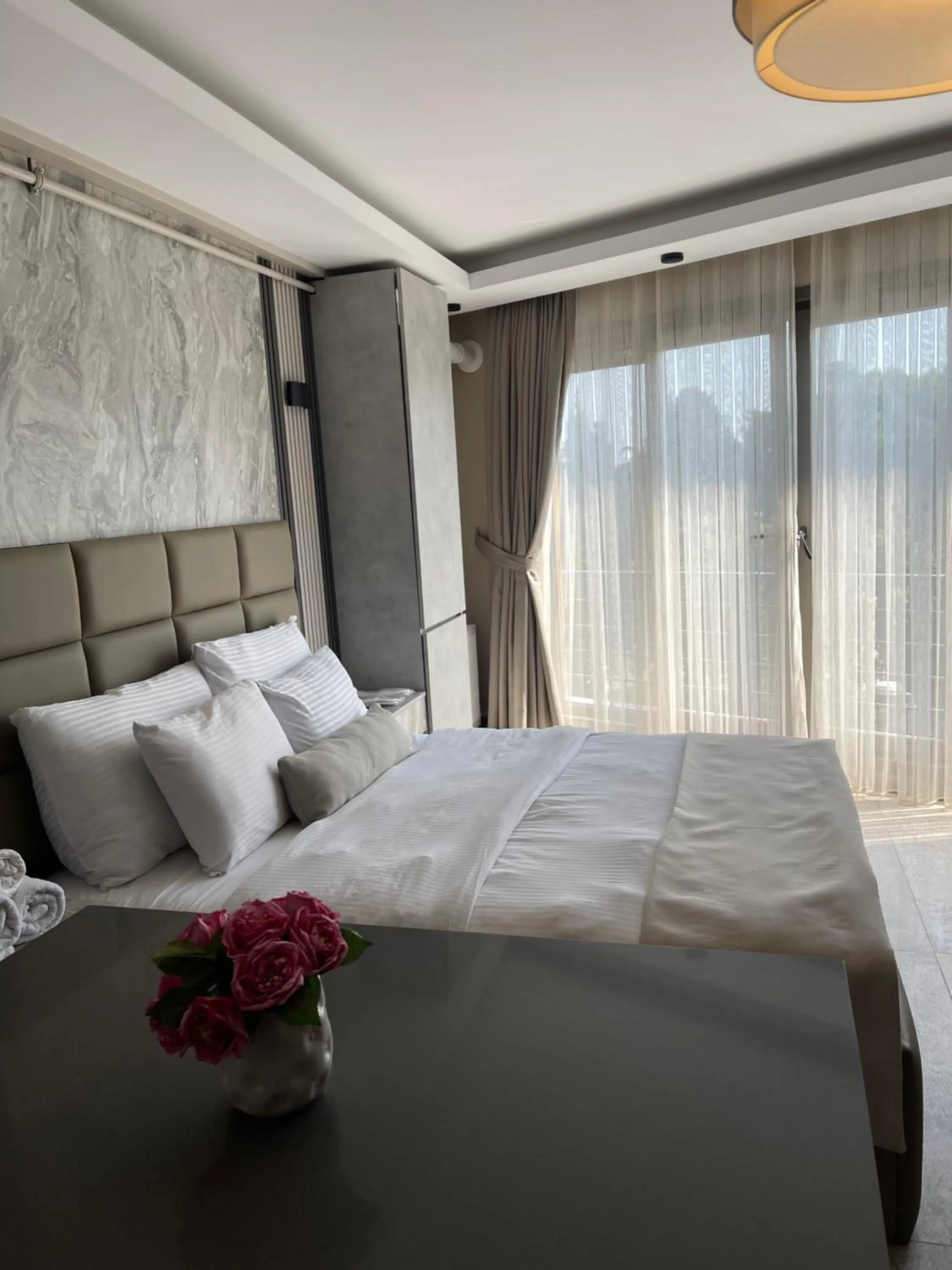 Bed in Aymira Suite Hotel