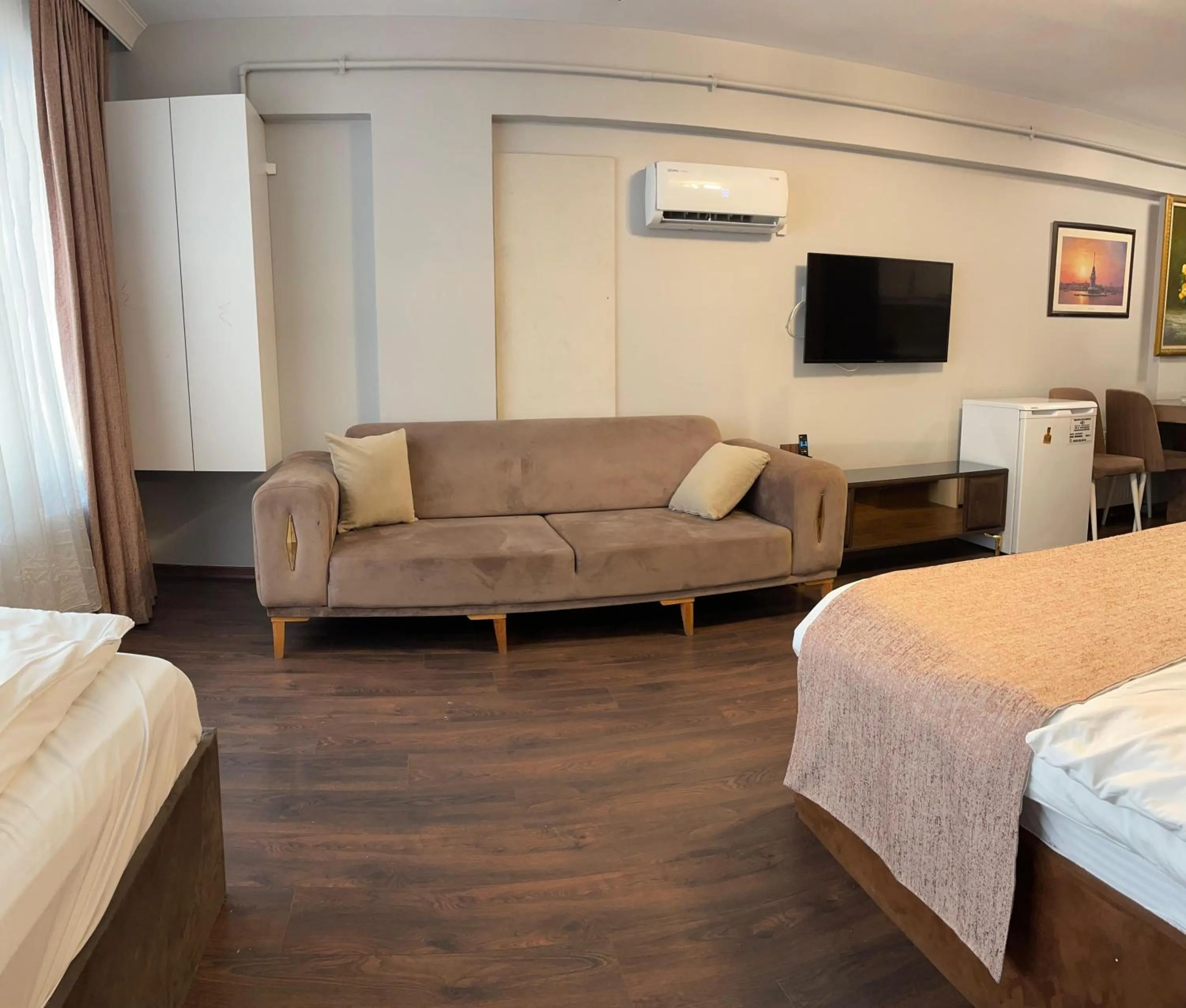 Bed in Aymira Suite Hotel