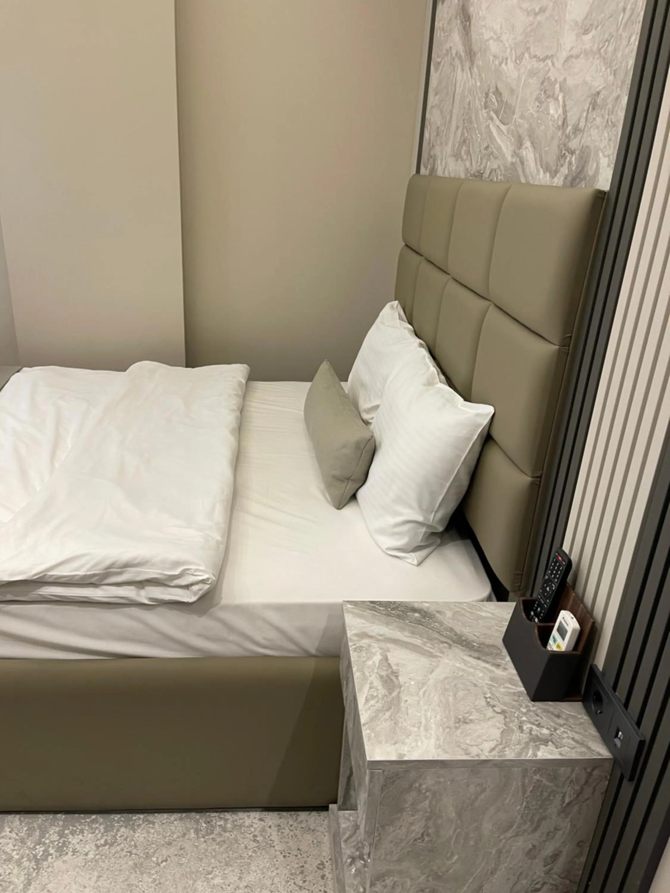 Bed in Aymira Suite Hotel