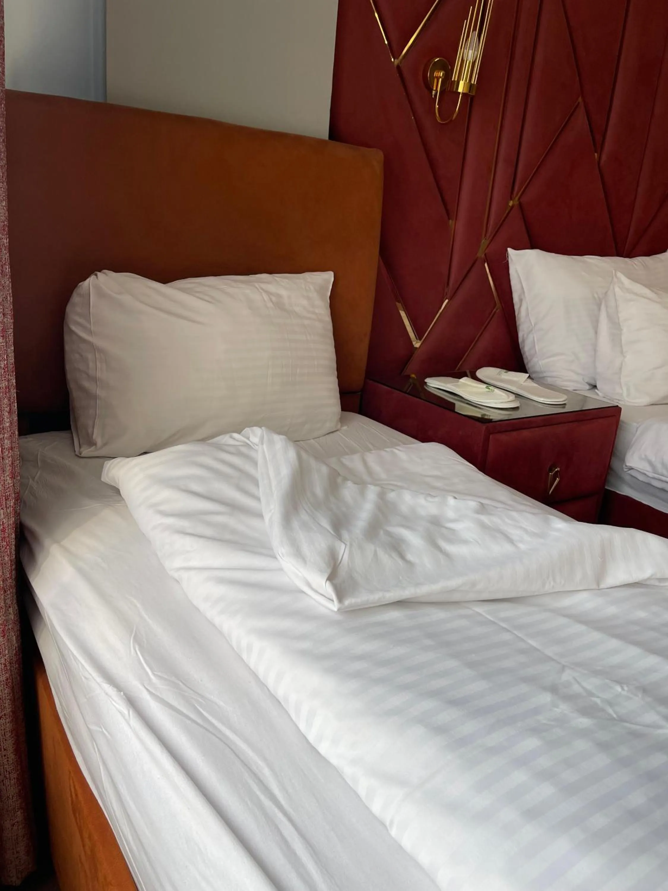 Bed in Aymira Suite Hotel