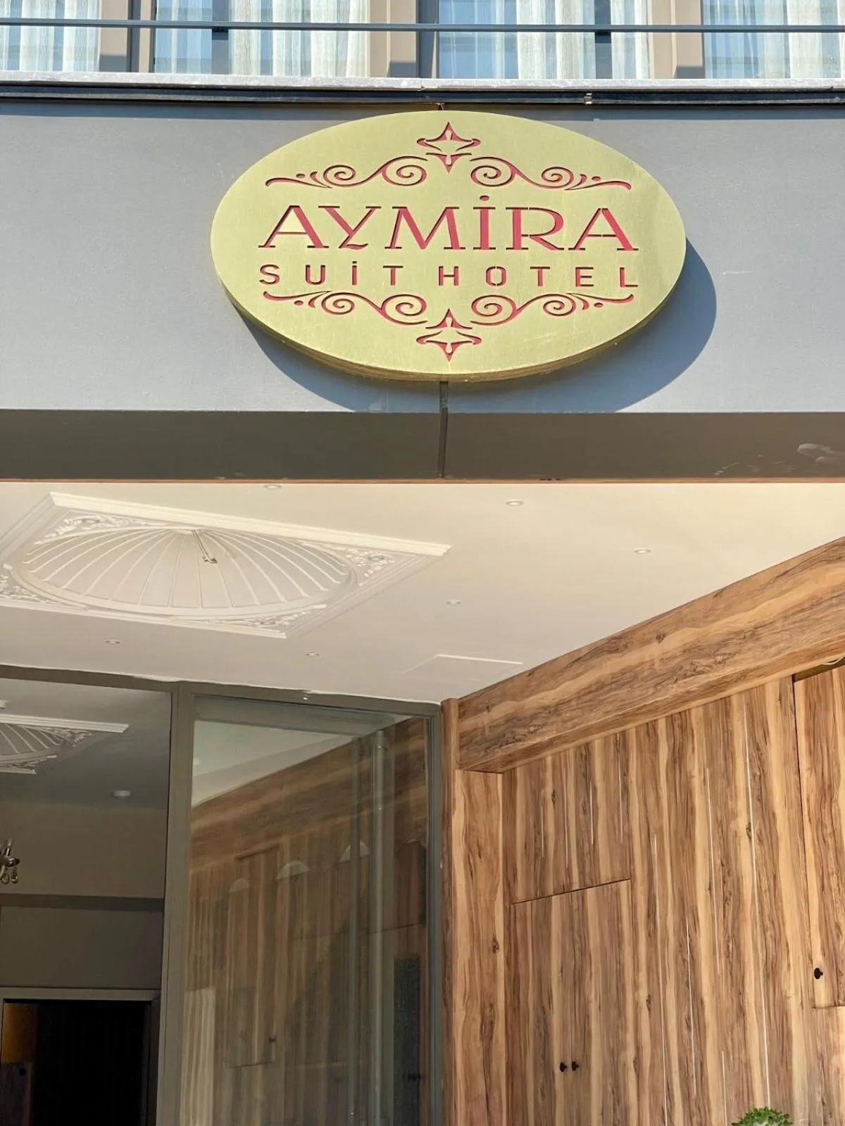 Property logo or sign in Aymira Suite Hotel