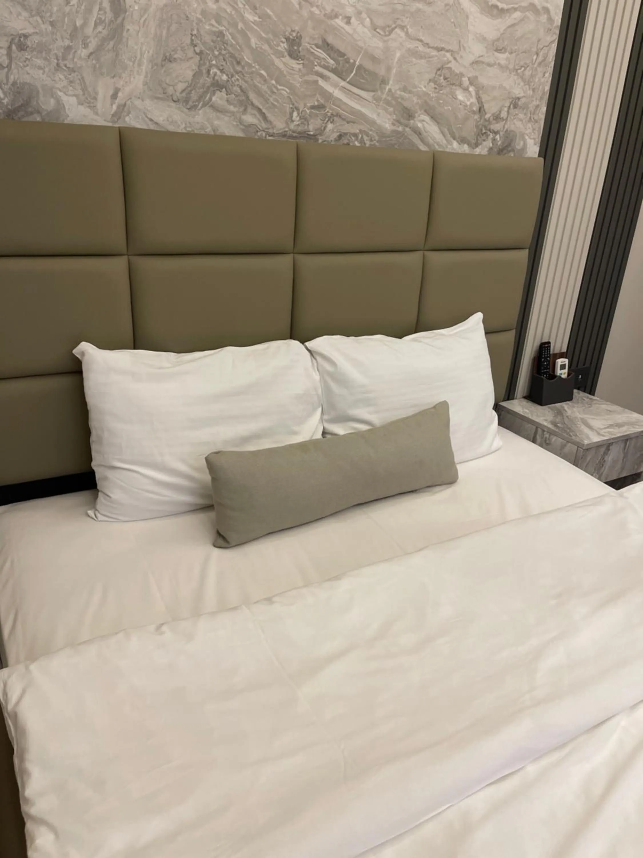 Bed in Aymira Suite Hotel