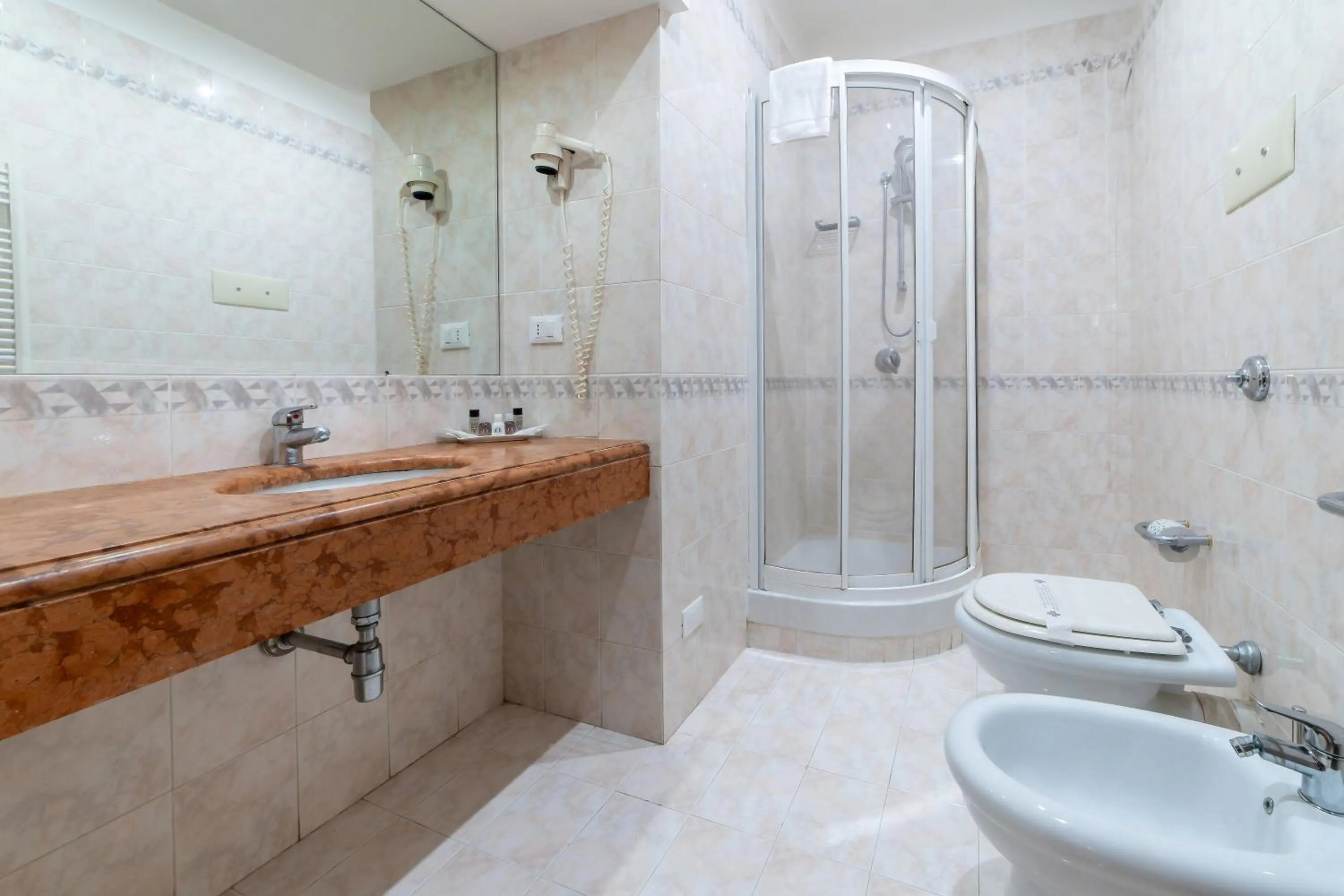 Bathroom in Massimo Plaza Hotel