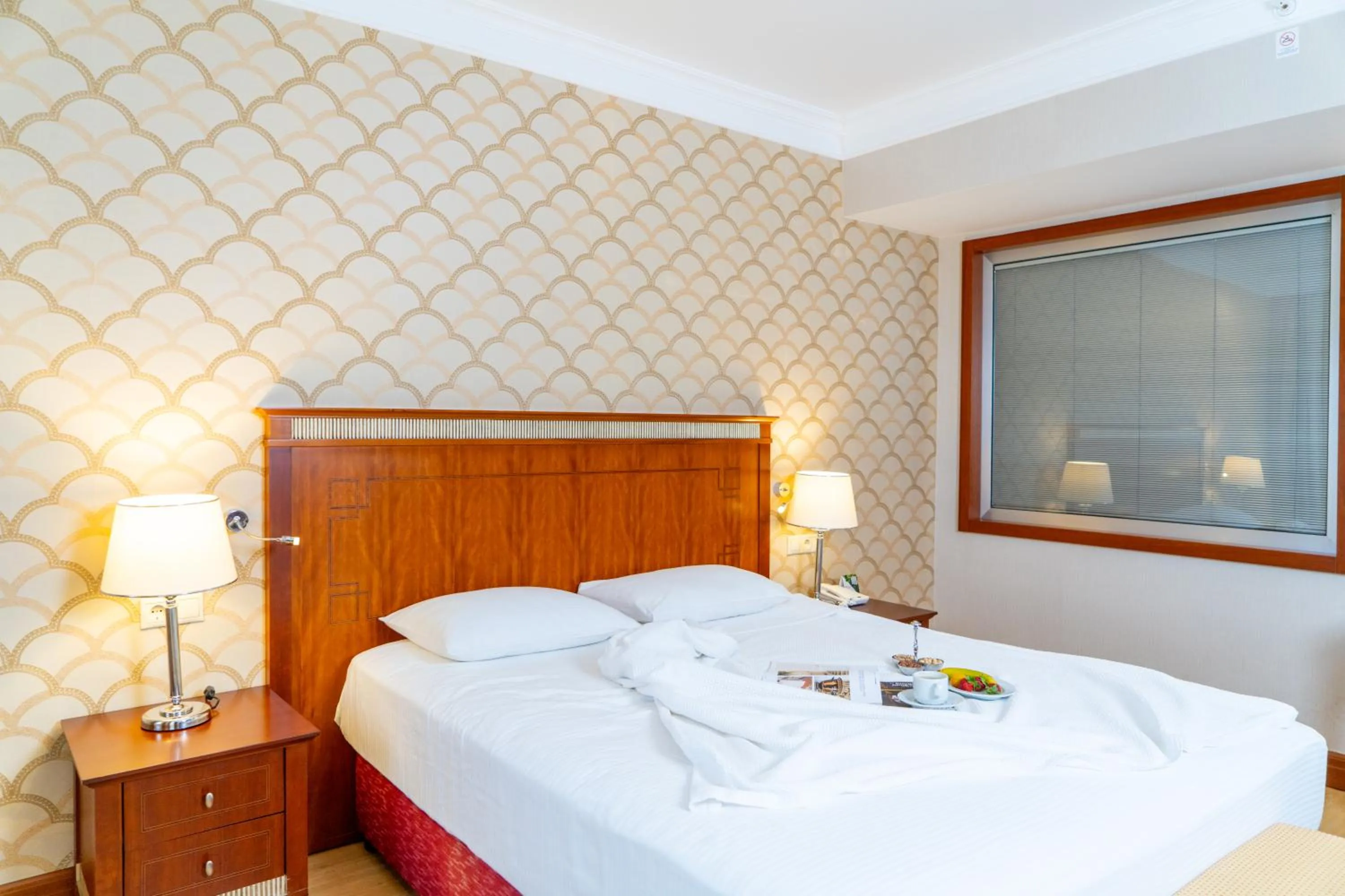 Bed in Belconti Resort Hotel