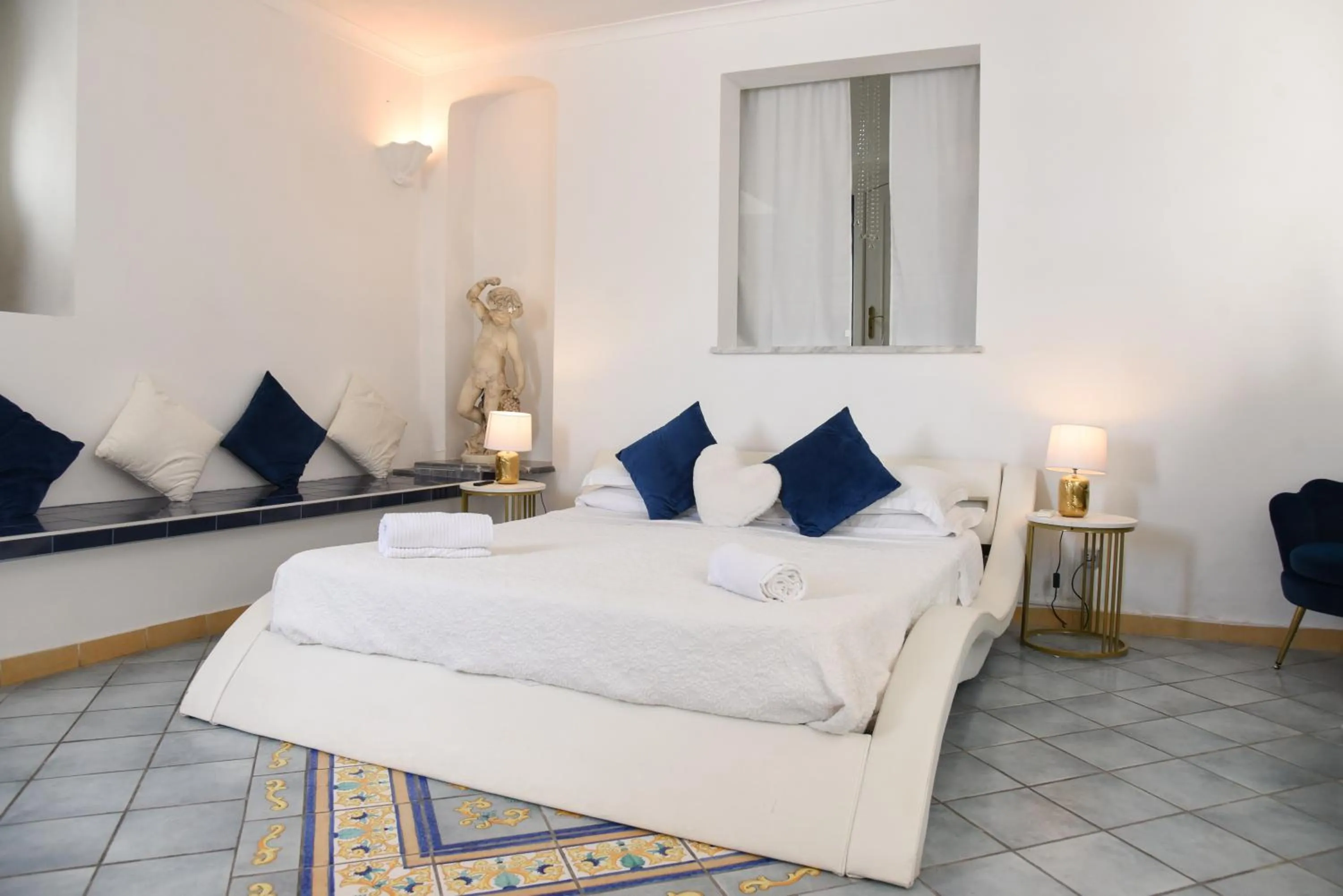 Bed in Villa La Terrazza Suites