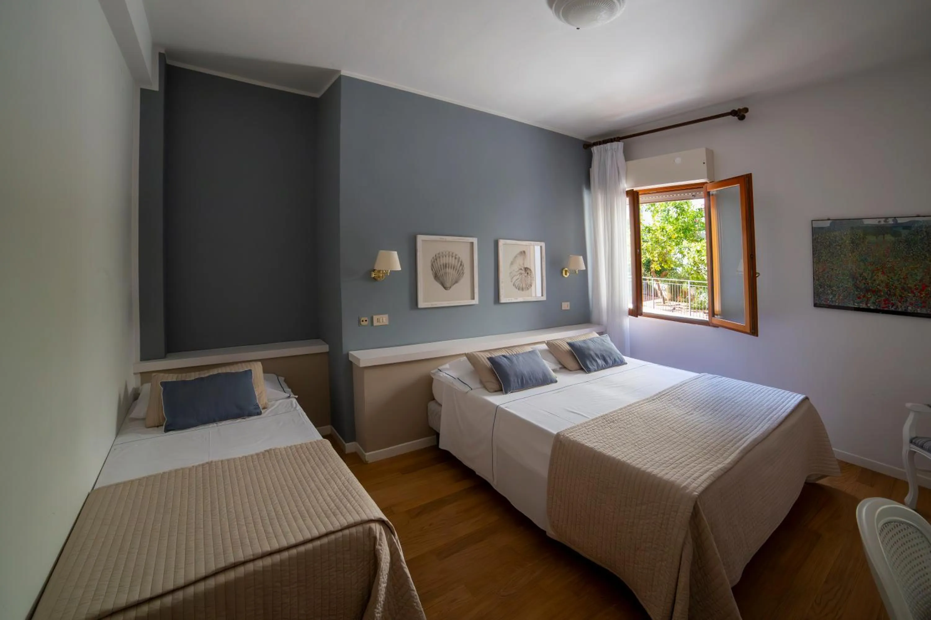 Bed in Hotel Punta Nord Est