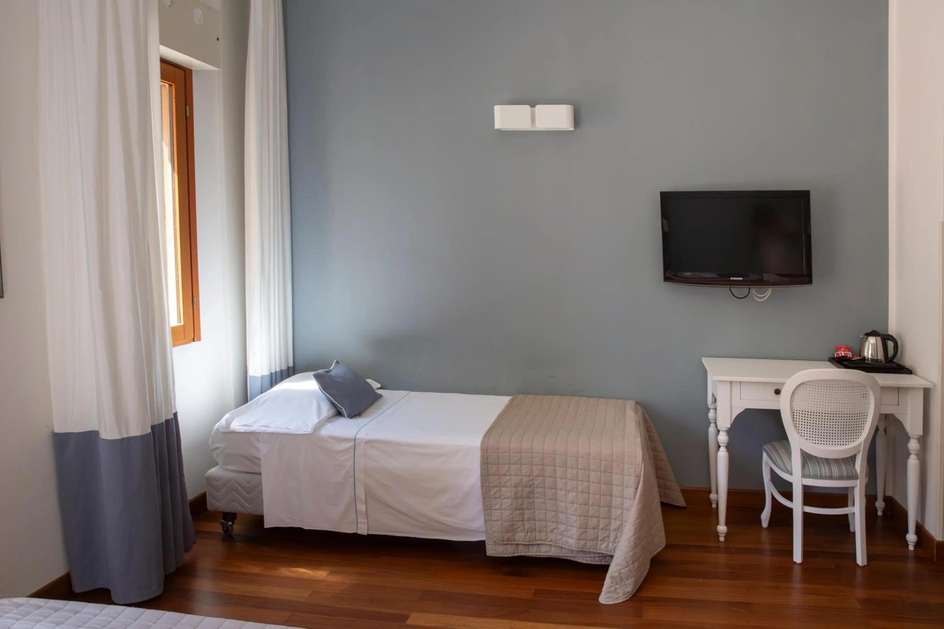 Bed in Hotel Punta Nord Est