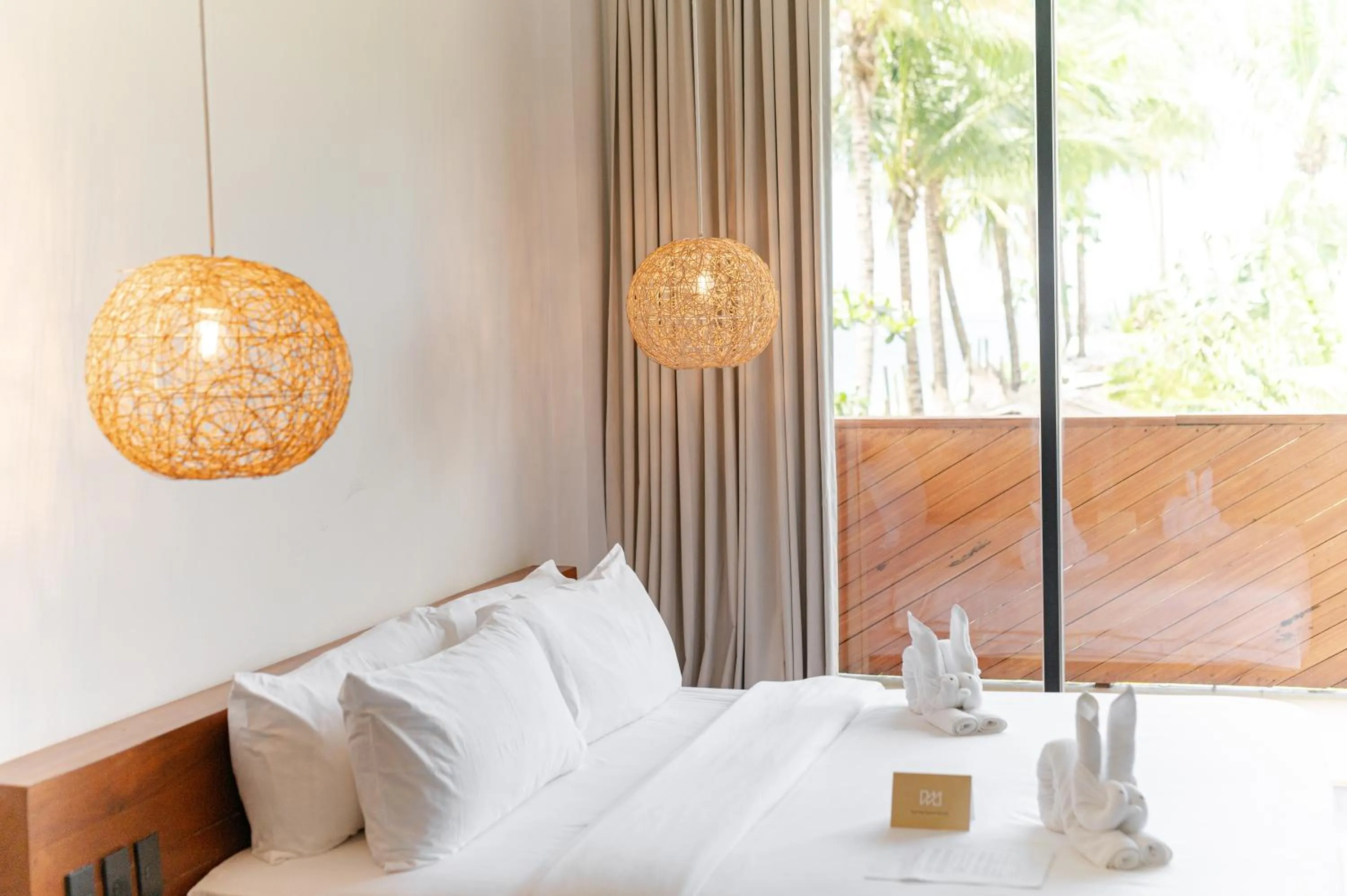 Bed in Nacpan Beach Resort Managed by H Hospitality Group