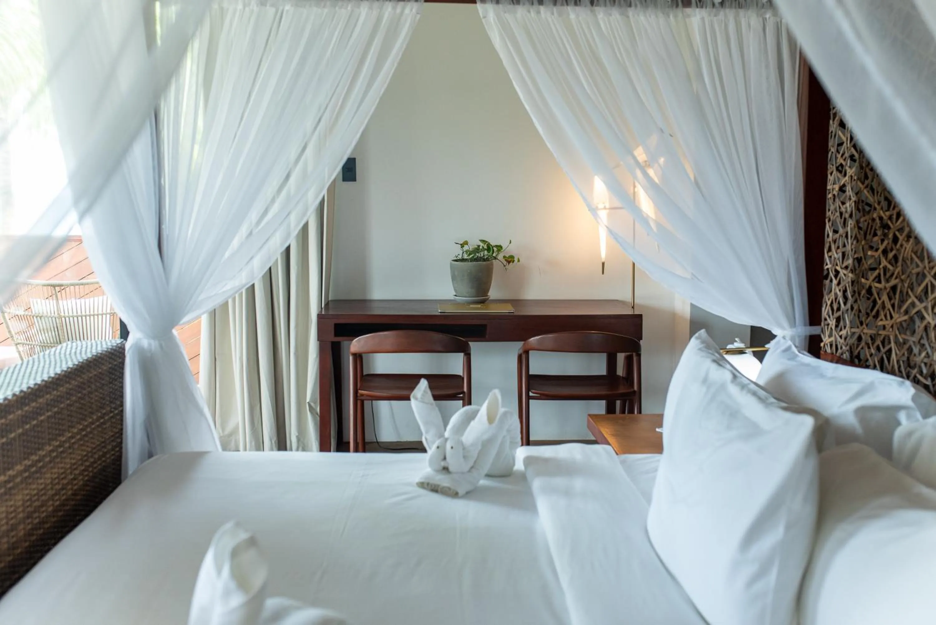 Bed in Nacpan Beach Resort Managed by H Hospitality Group