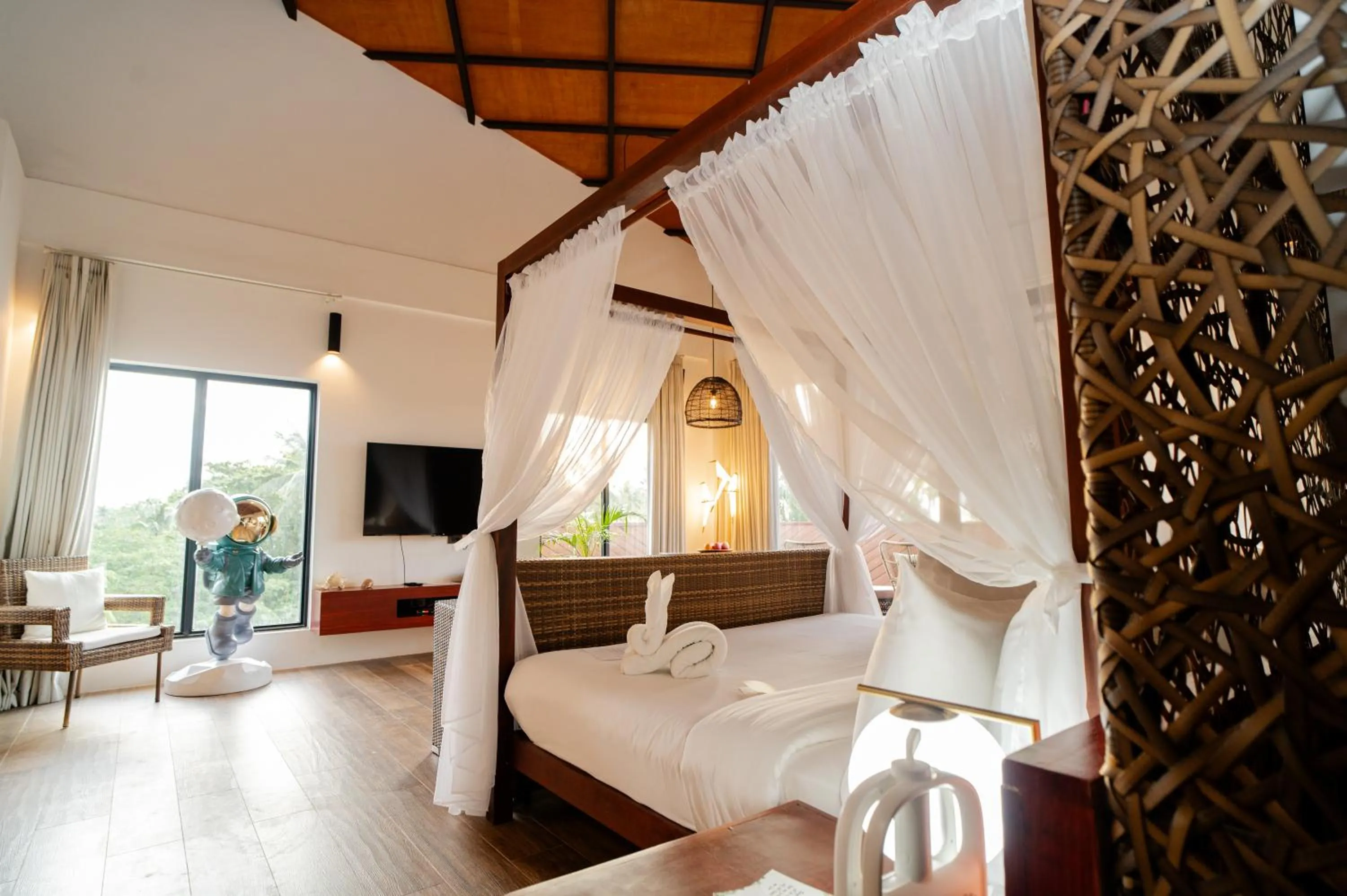 Bed in Nacpan Beach Resort Managed by H Hospitality Group