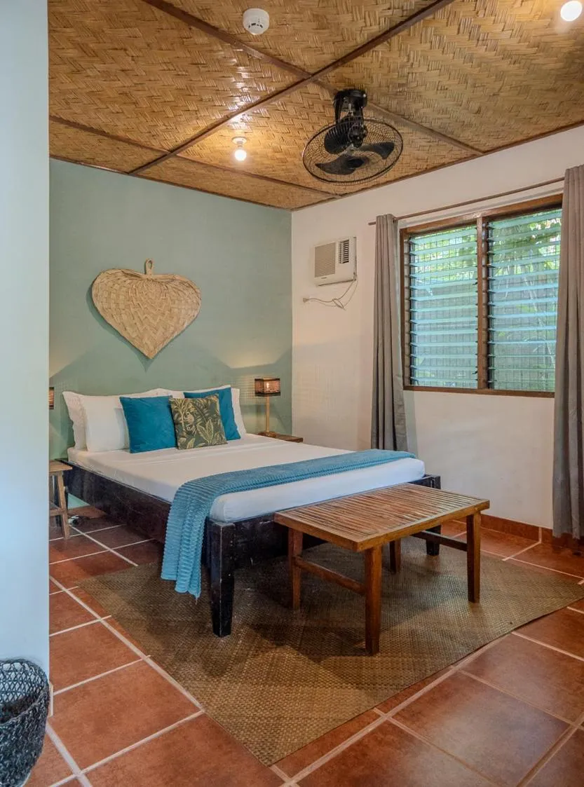 Bed in Golden Monkey Beach Hotel