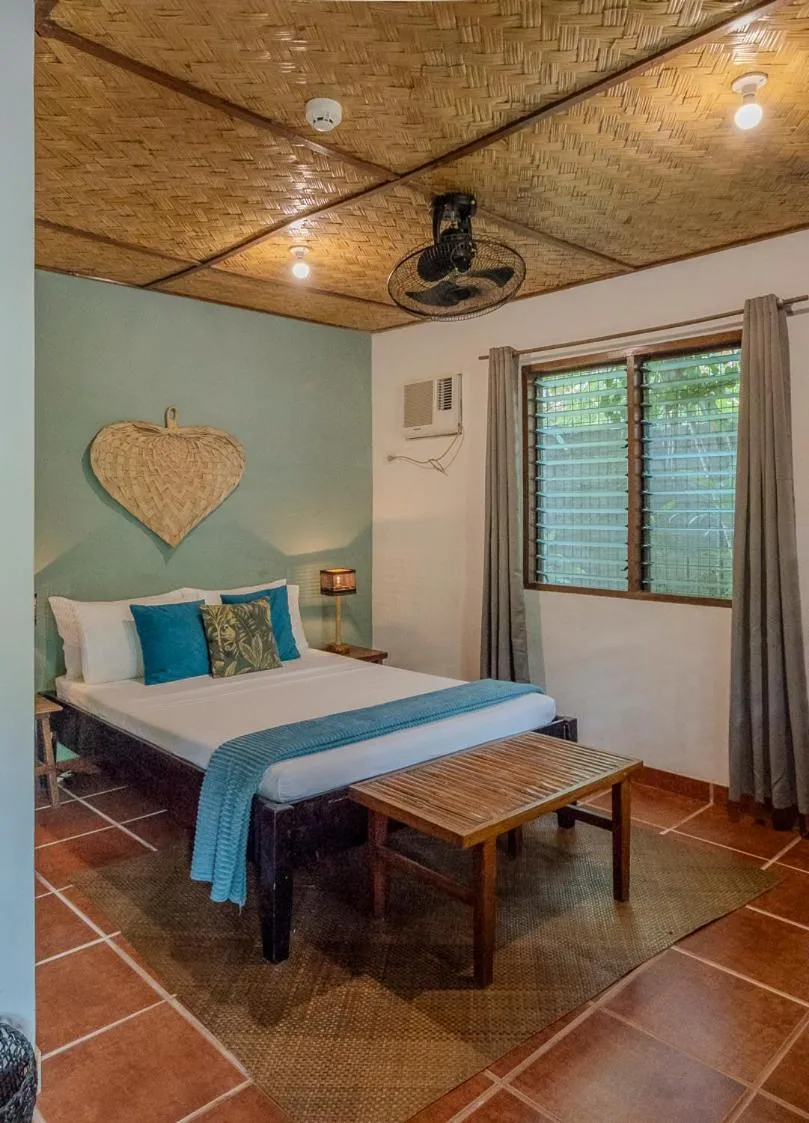 Bed in Golden Monkey Beach Hotel