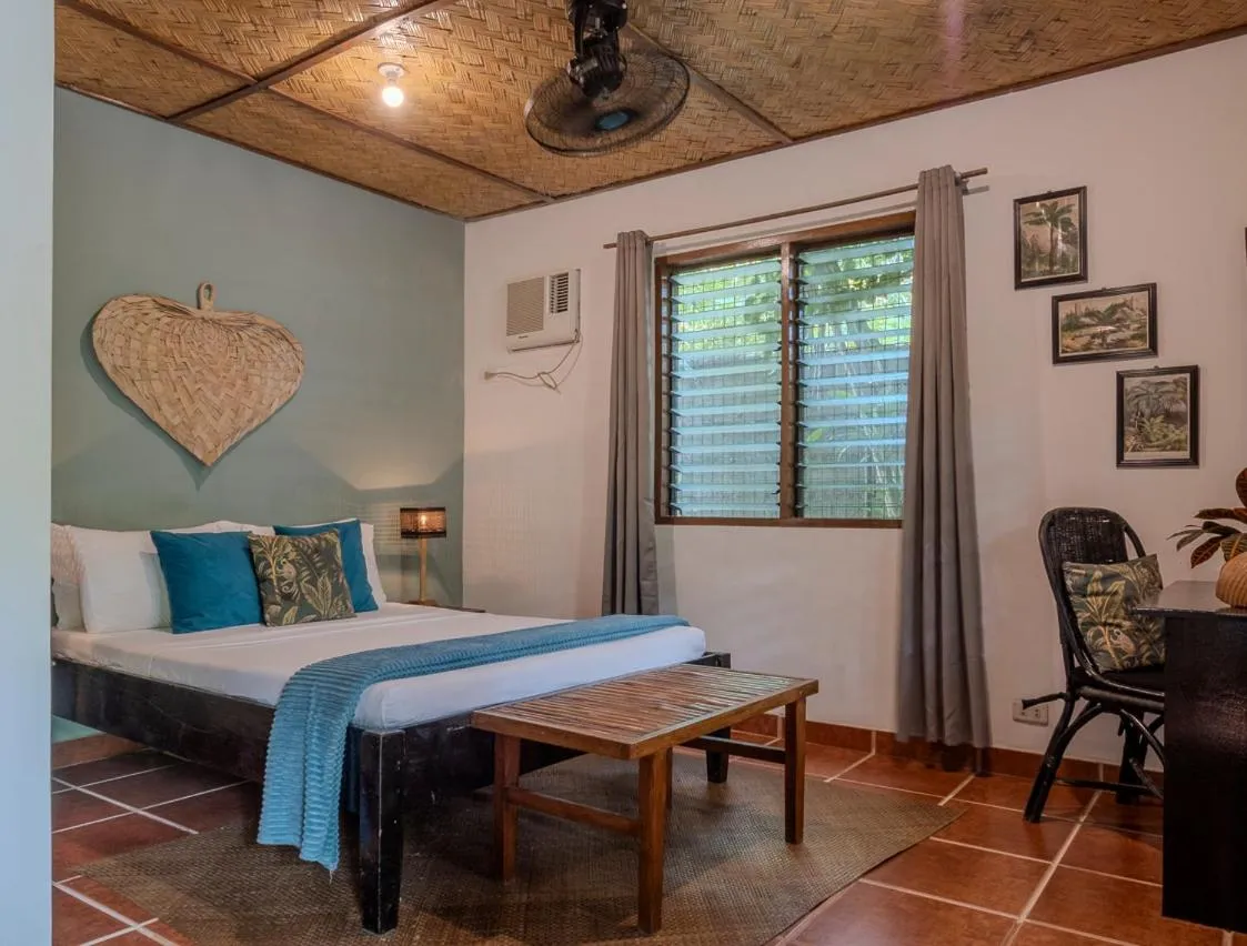 Bed in Golden Monkey Beach Hotel