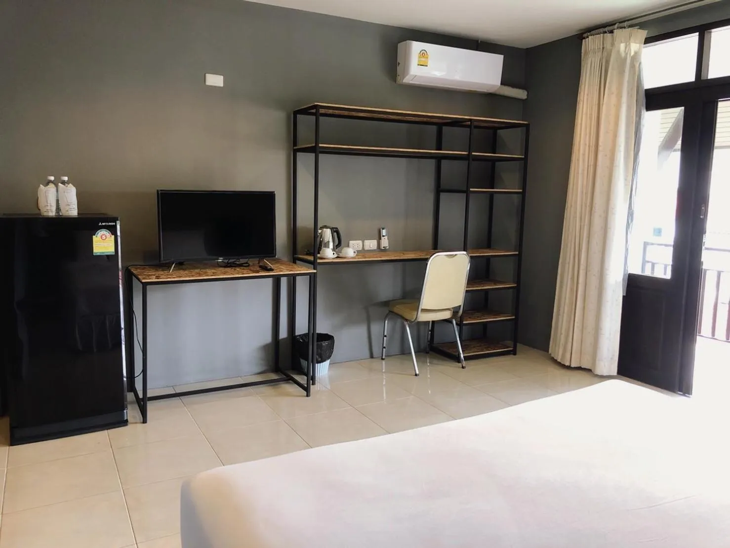 TV and multimedia, Bed in Laemdin Hotel