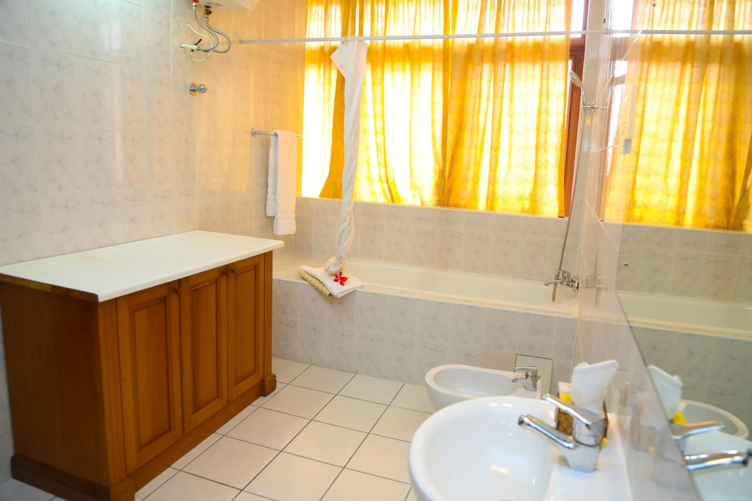 Bathroom in Coconut Grove Regency Hotel