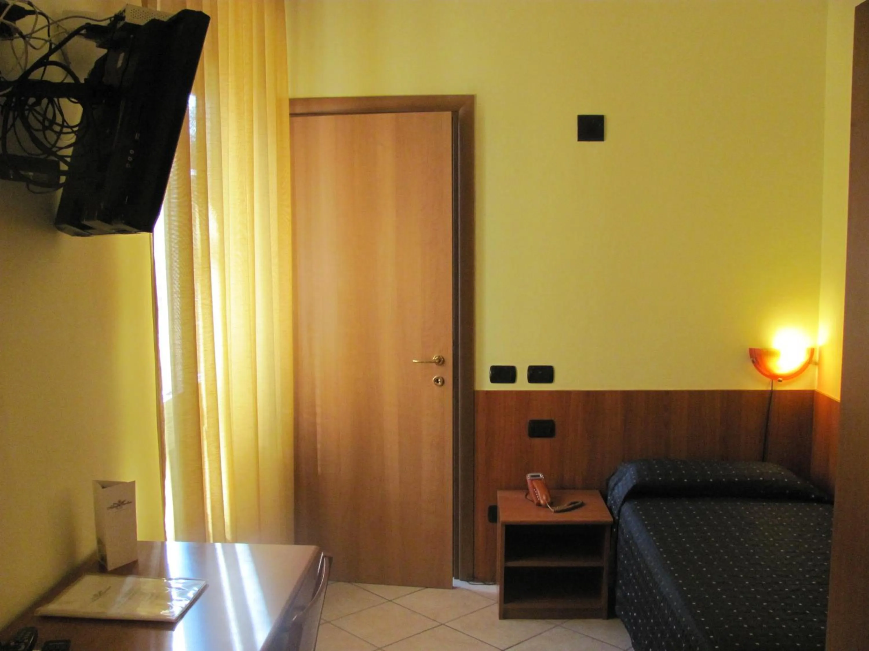 Decorative detail, Bed in Albergo Hotel Giardino