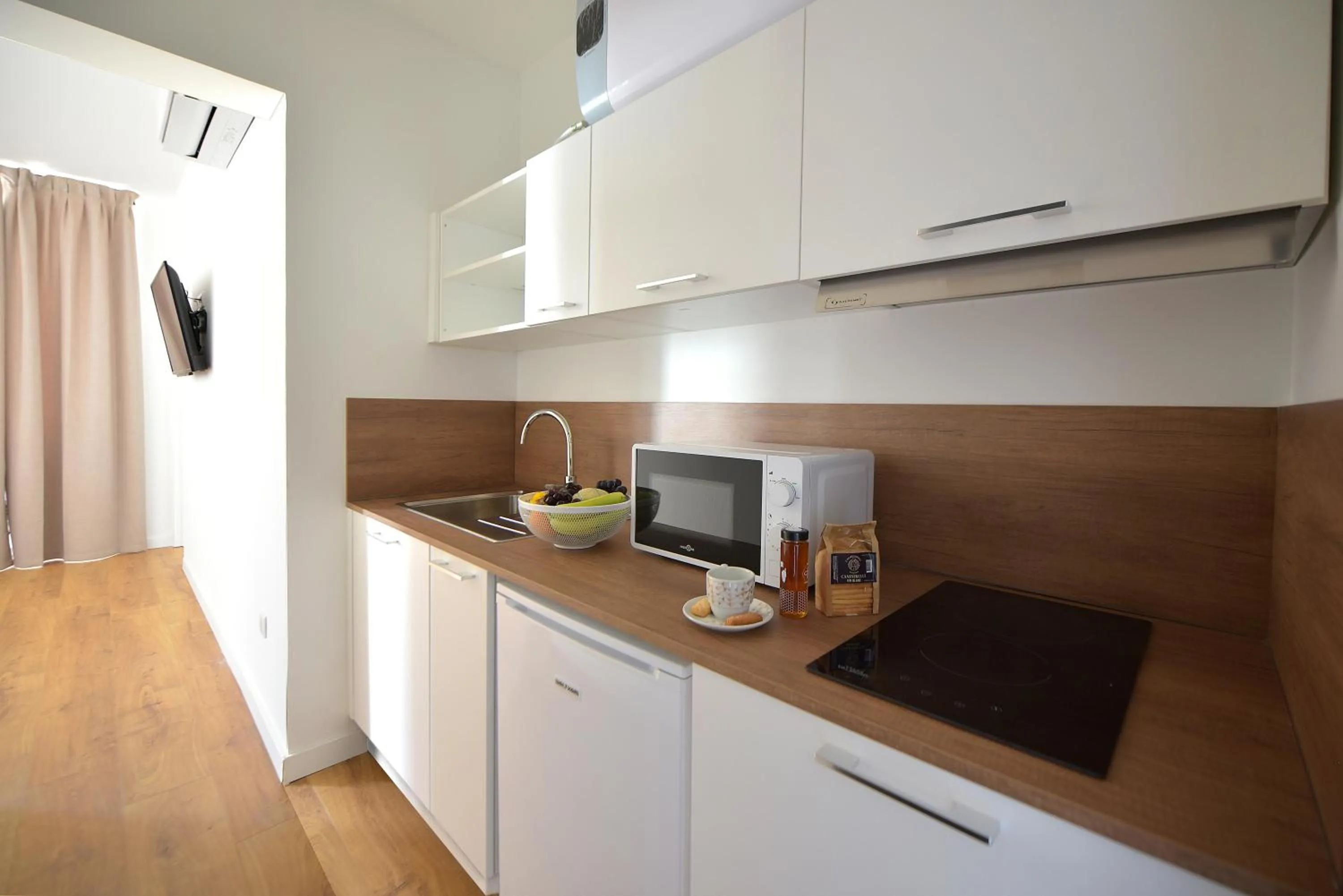 Kitchen or kitchenette in Hôtel Continental