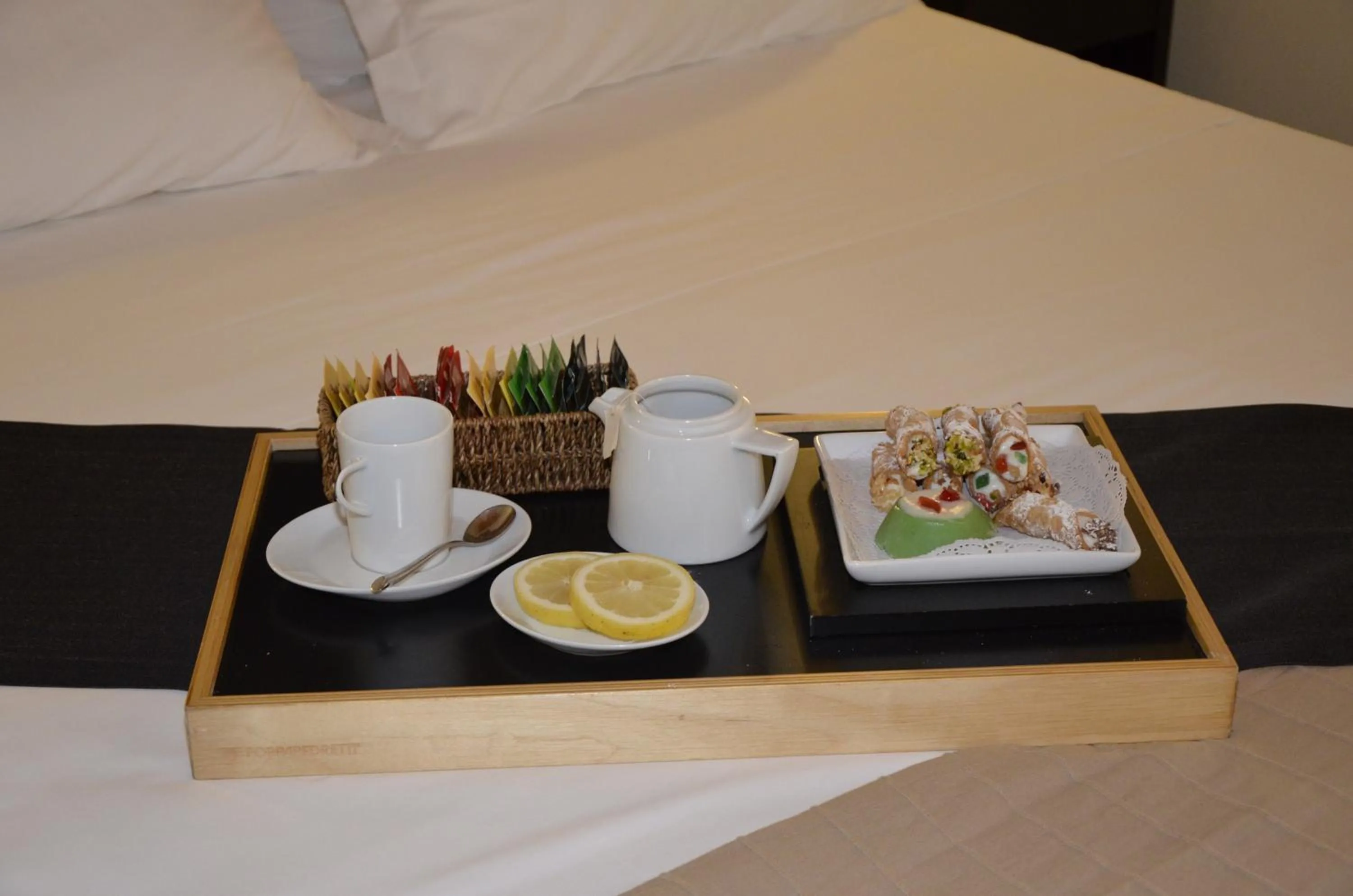 Decorative detail, Bed in Cassisi Hotel